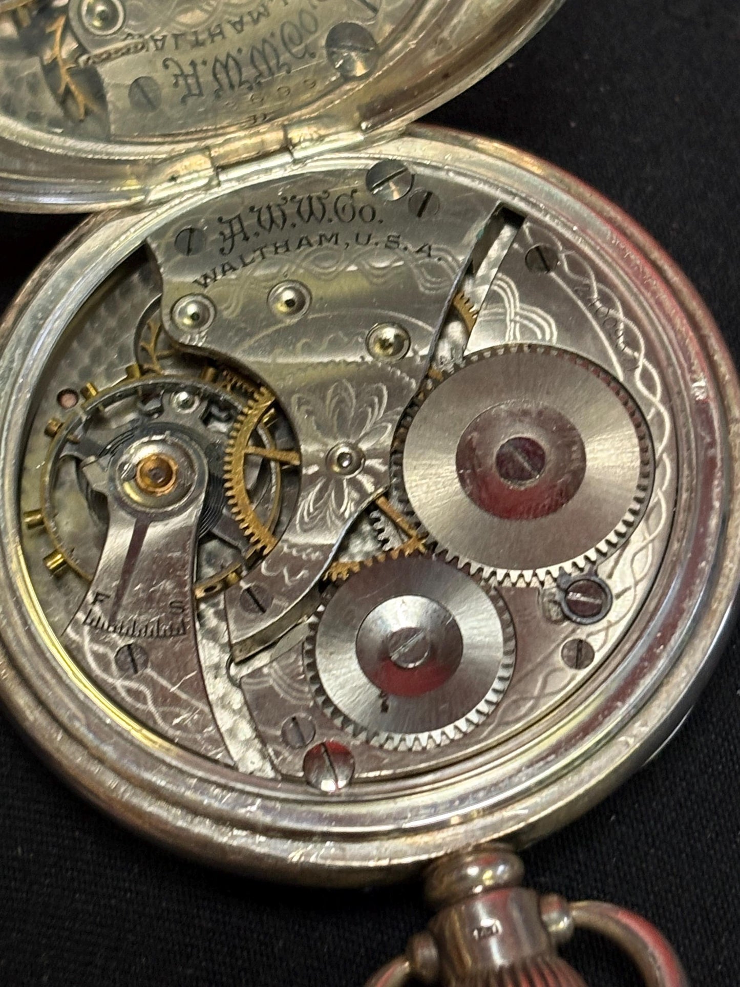 Stunning English sterling silver  Waltham  pocket watch  hallmarked and 3 inches long -  in perfect  condition and working well  wow - B