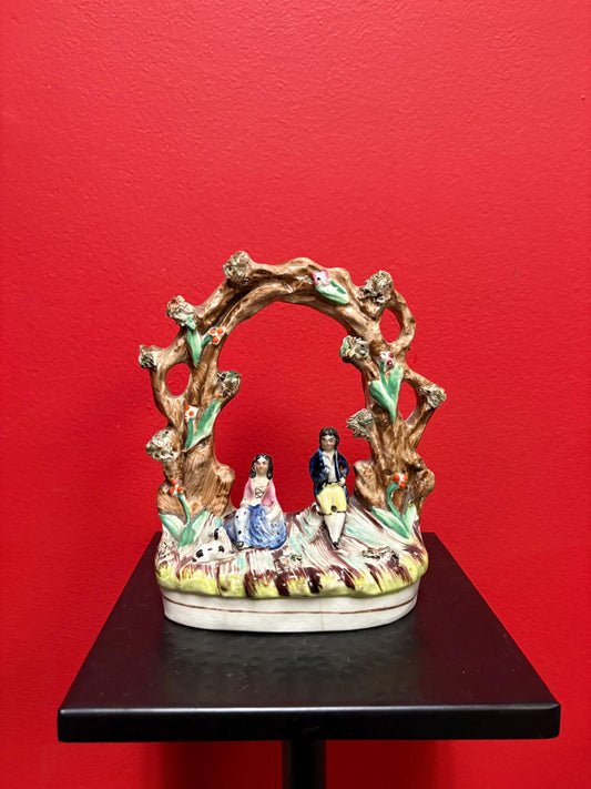 A 7 inch tall antique Staffordshire statue  great antique condition - see photos