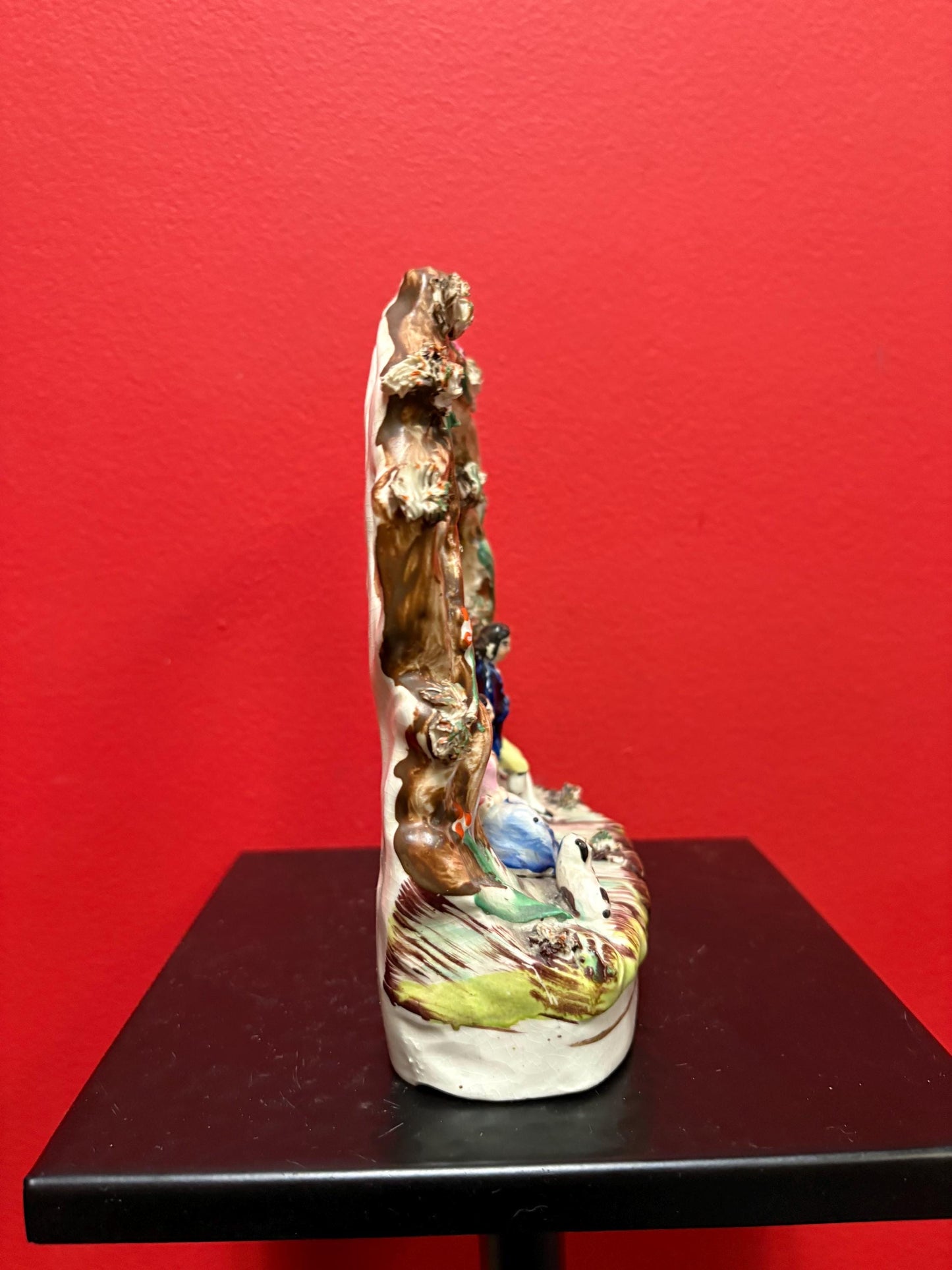 A 7 inch tall antique Staffordshire statue  great antique condition - see photos