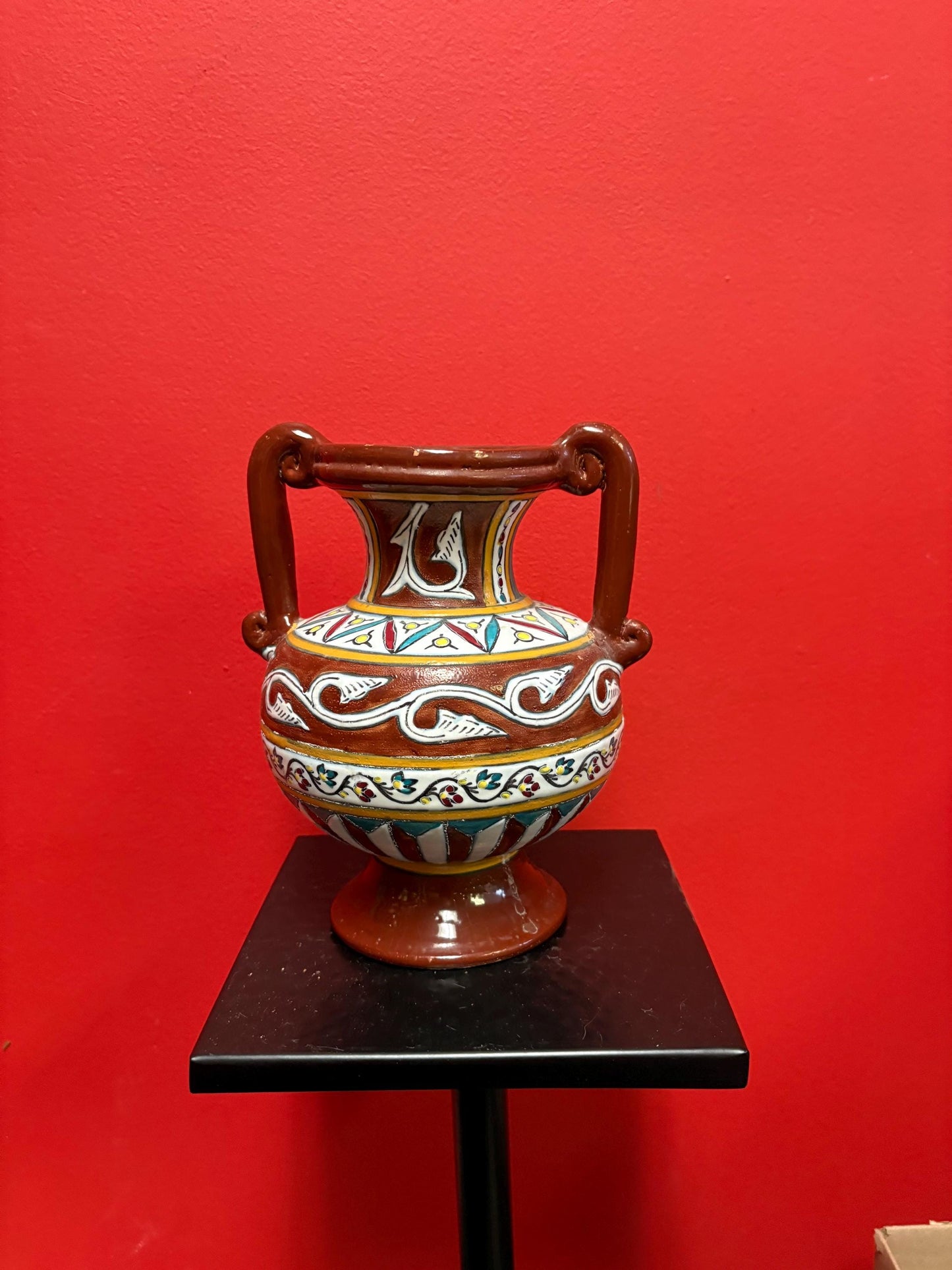 Beautiful African pottery vase  8.5 inches tall  bought in Africa in 1965  one chip  great shape and colours