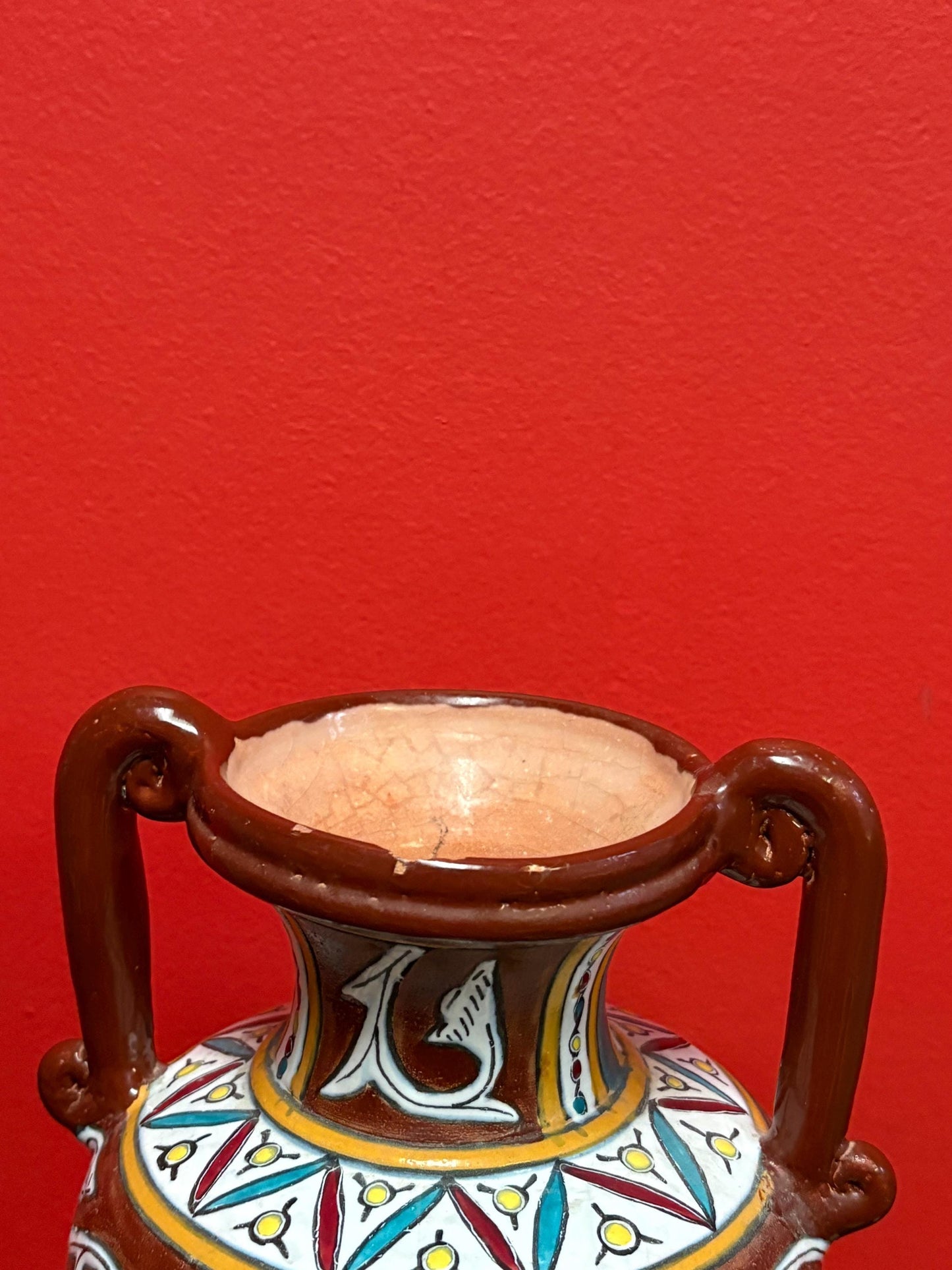 Beautiful African pottery vase  8.5 inches tall  bought in Africa in 1965  one chip  great shape and colours