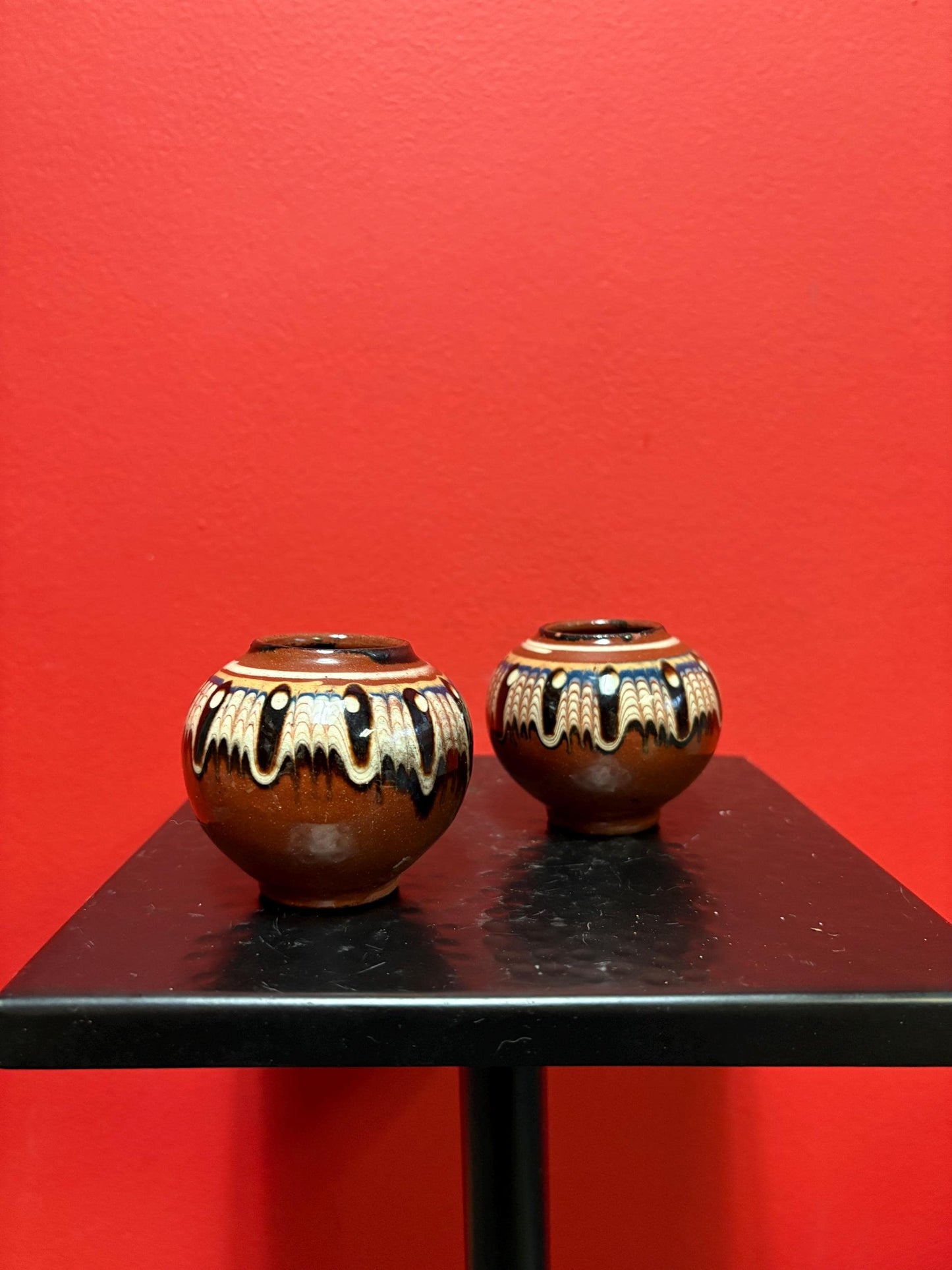 Lovely pair of 2 1/2 inch high South American terra-cotta painted pots  one chipped and one perfect  great value