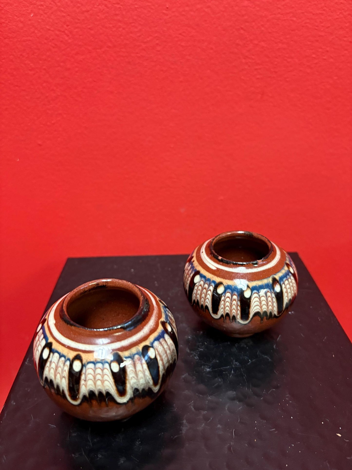 Lovely pair of 2 1/2 inch high South American terra-cotta painted pots  one chipped and one perfect  great value