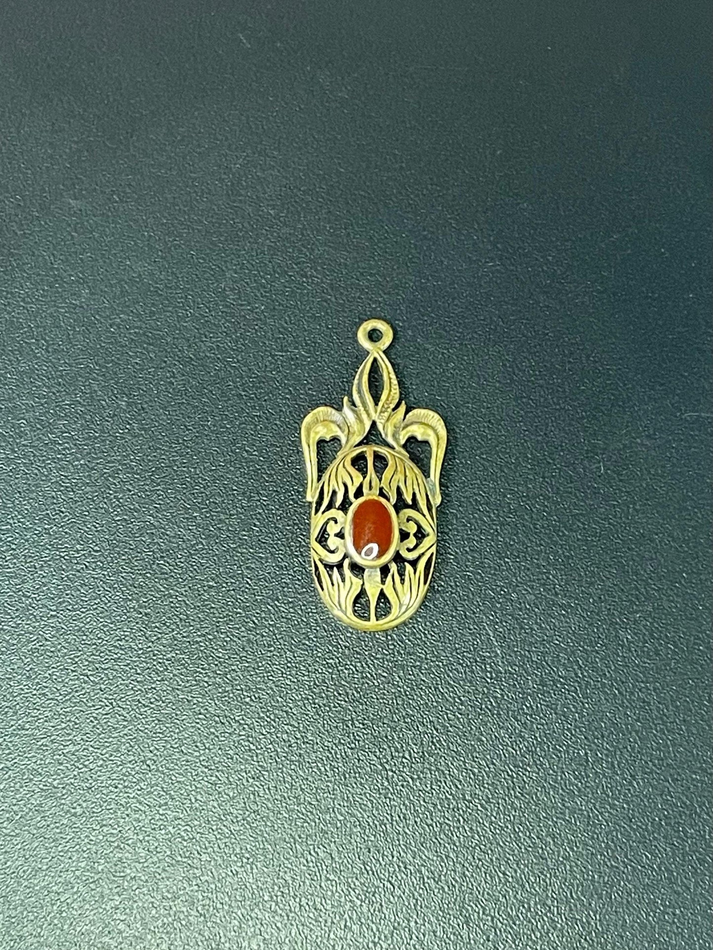 Delicate Necklace Pendant with red stone Center