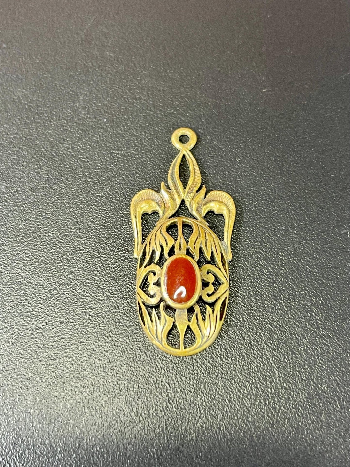 Delicate Necklace Pendant with red stone Center