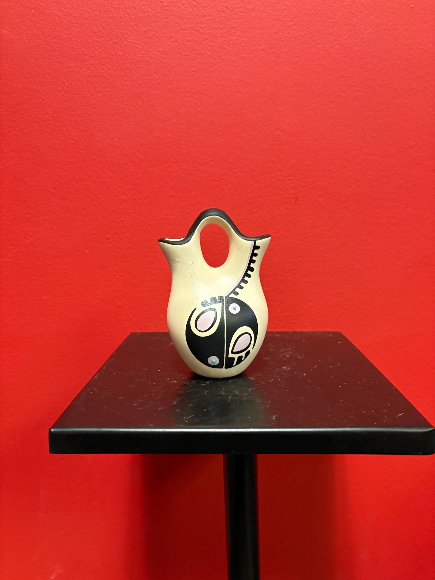 Lovely 4 1/2 inch tall signed Navajo pottery vase  great colour and shape