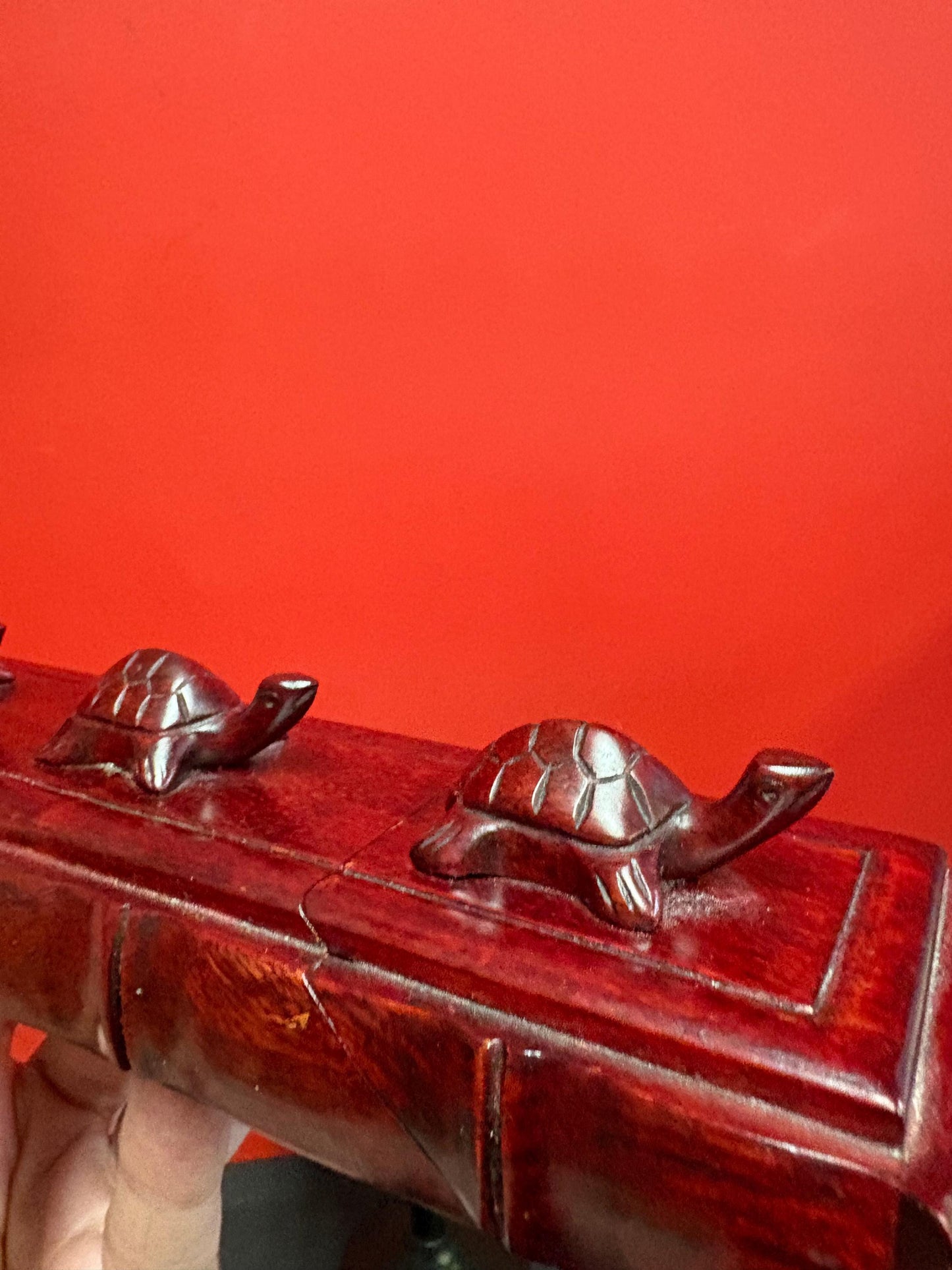 Lovely Asian Rosewood chopstick box with turtles on top  9 inches long  comes with five sets of chopsticks  wonderful gift