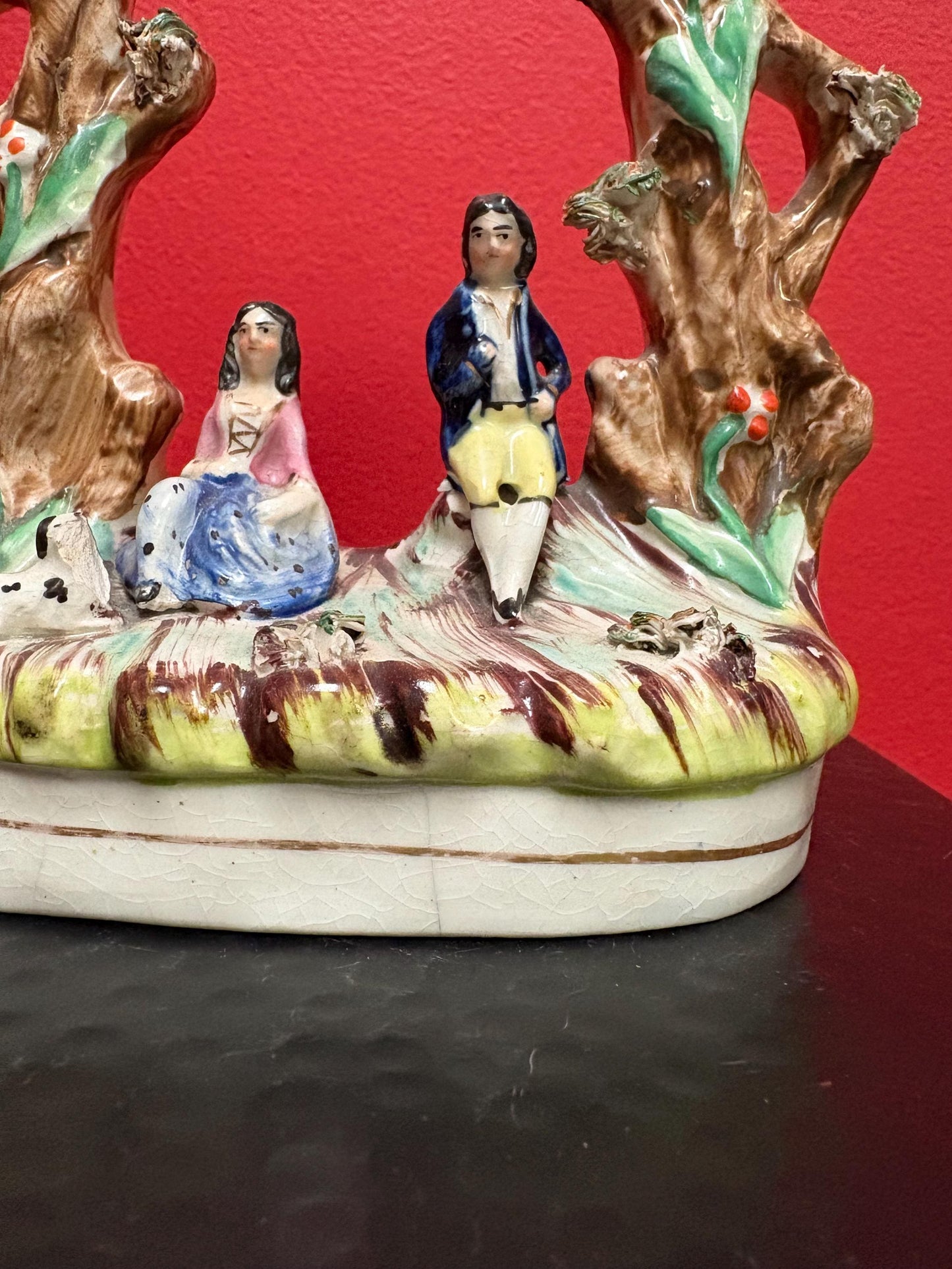 A 7 inch tall antique Staffordshire statue  great antique condition - see photos