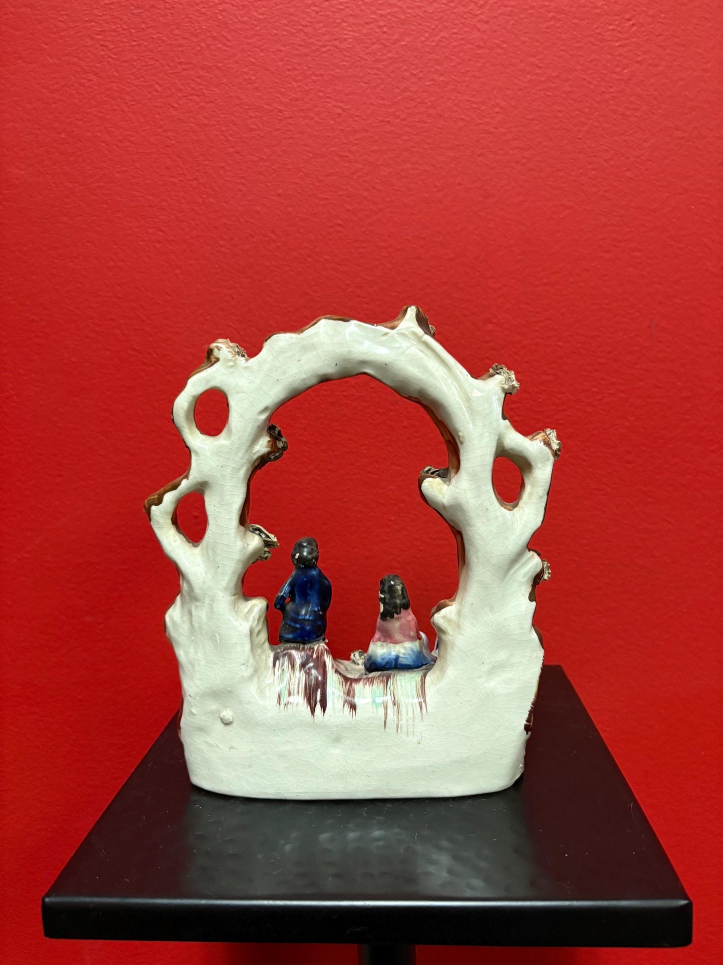 A 7 inch tall antique Staffordshire statue  great antique condition - see photos