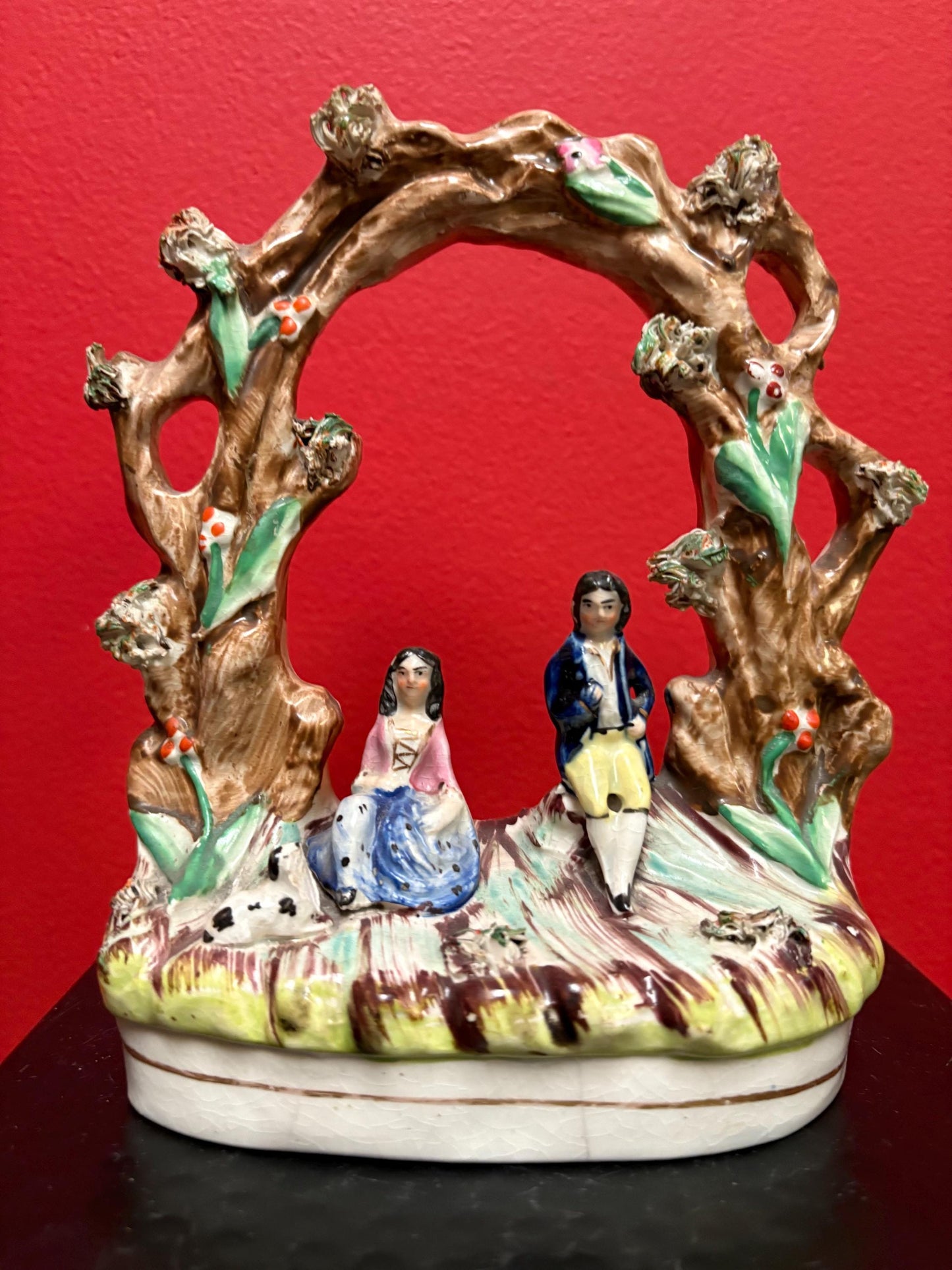 A 7 inch tall antique Staffordshire statue  great antique condition - see photos