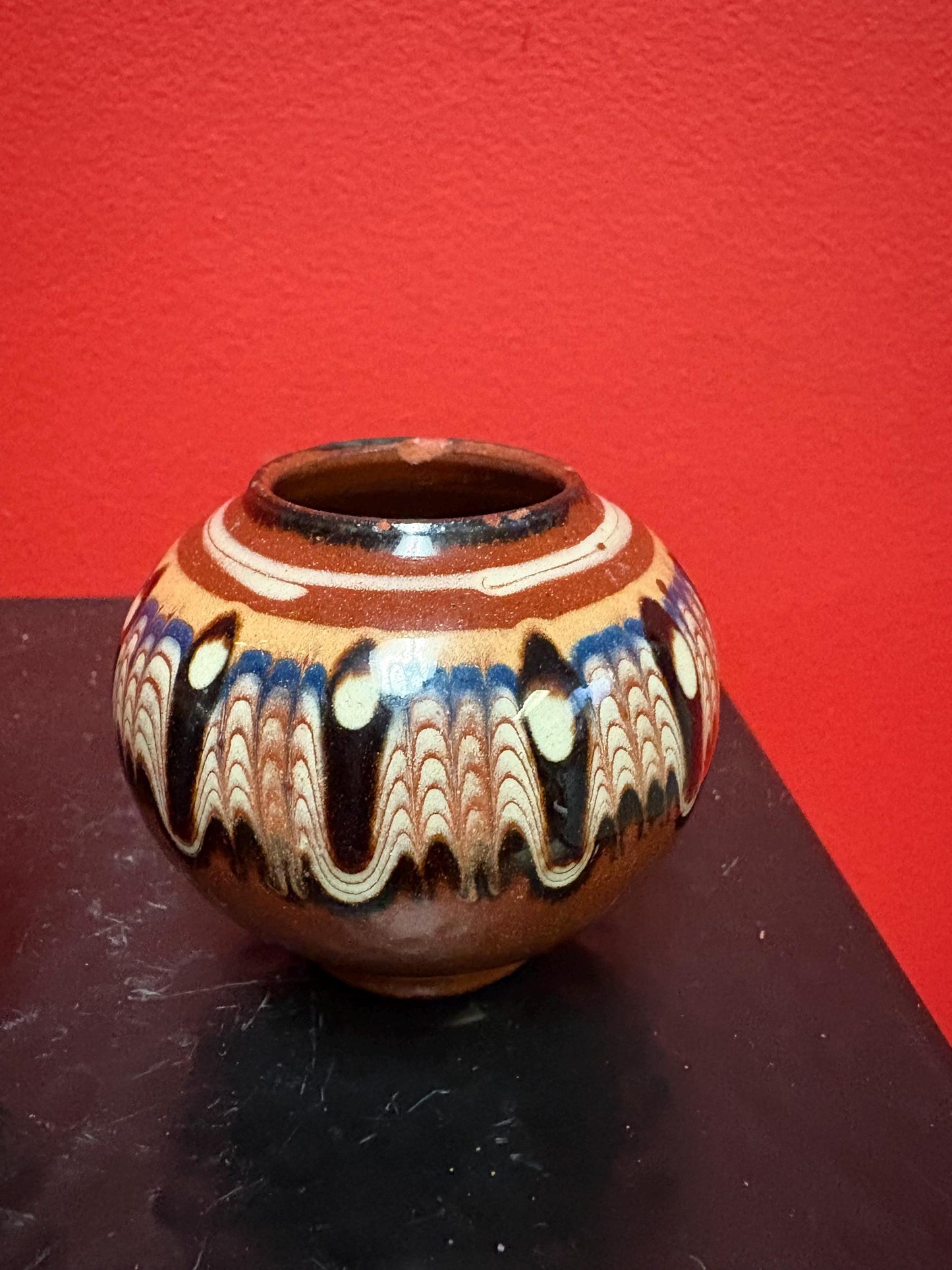 Lovely pair of 2 1/2 inch high South American terra-cotta painted pots  one chipped and one perfect  great value