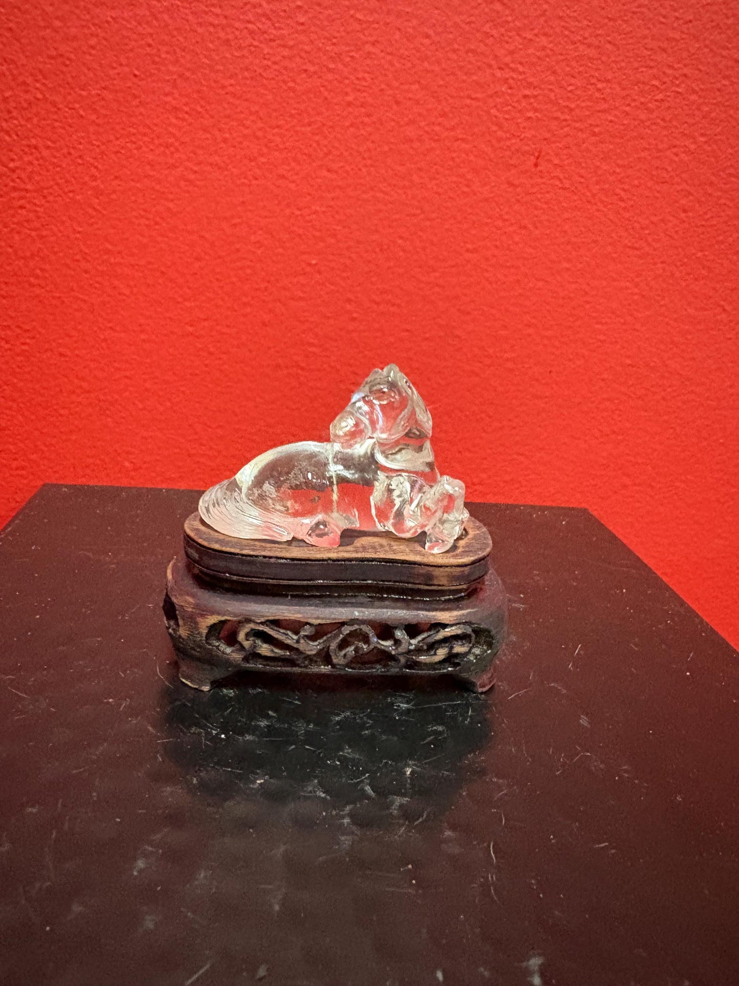 Lovely 2 inch long Chinese rock crystal horse on carved wooden stand