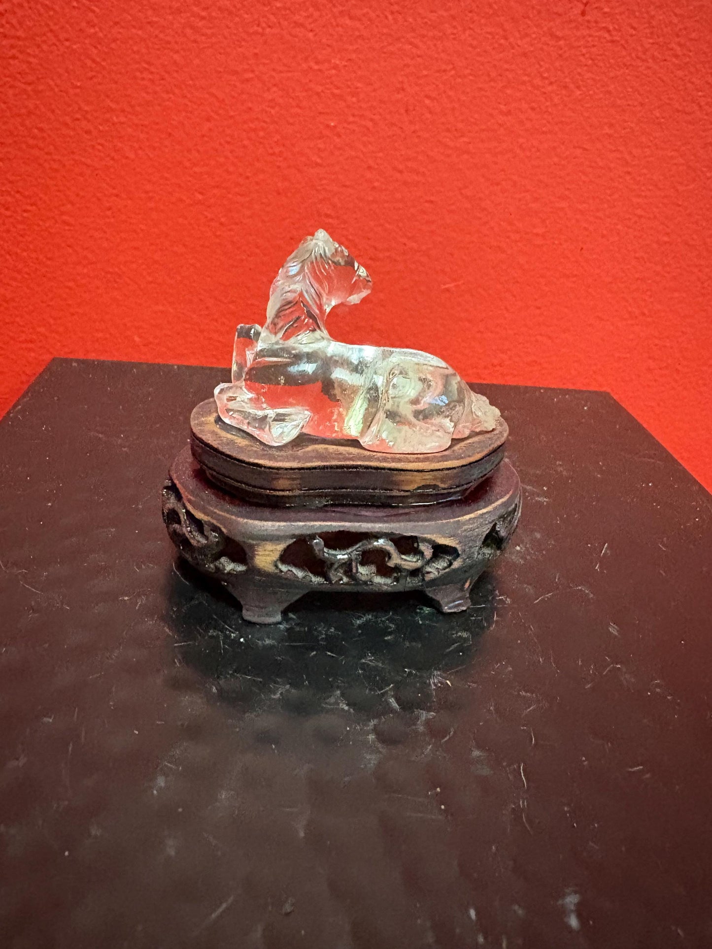 Lovely 2 inch long Chinese rock crystal horse on carved wooden stand