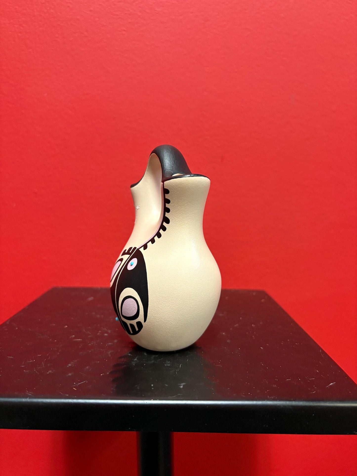 Lovely 4 1/2 inch tall signed Navajo pottery vase  great colour and shape