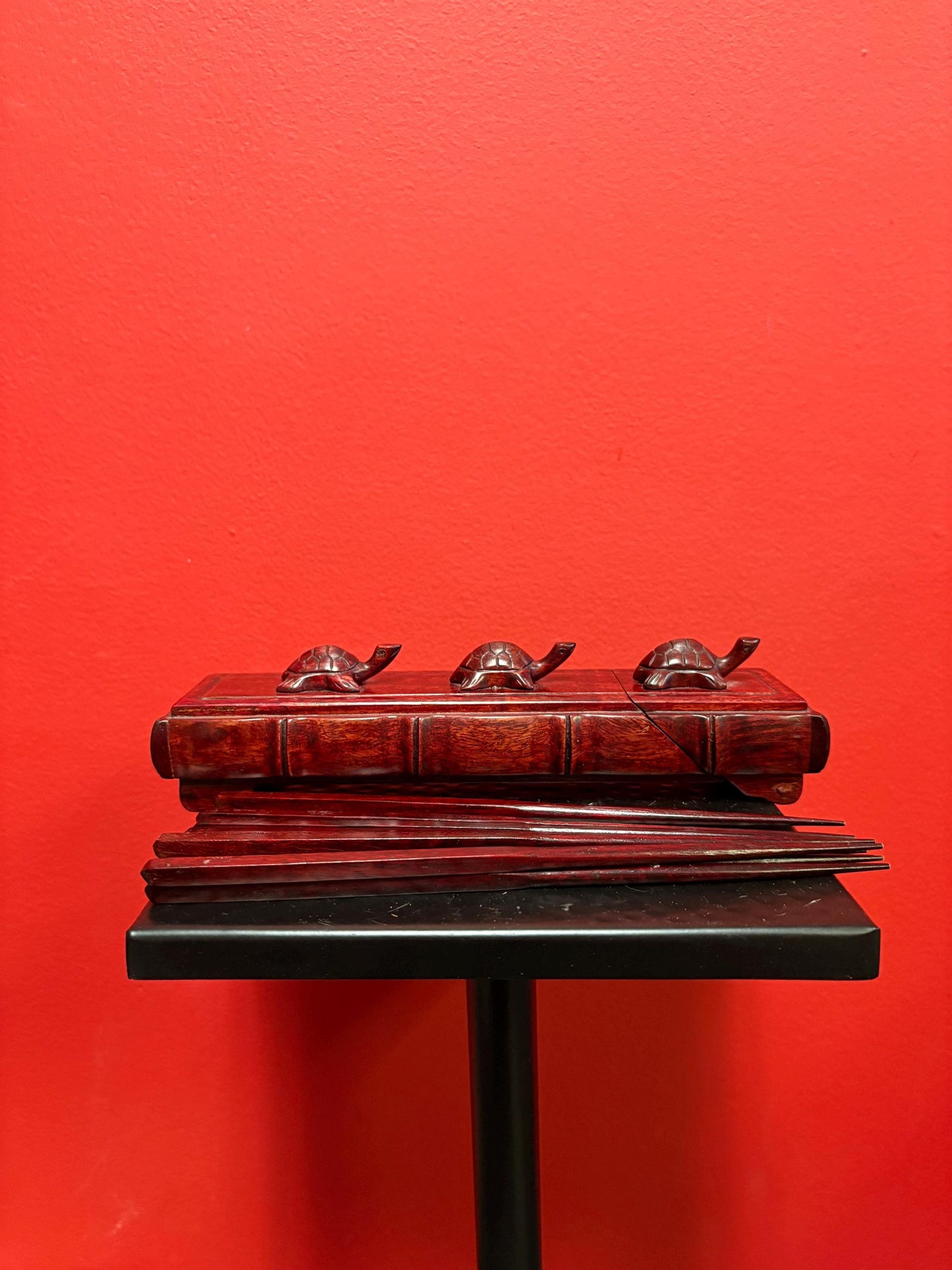 Lovely Asian Rosewood chopstick box with turtles on top  9 inches long  comes with five sets of chopsticks  wonderful gift