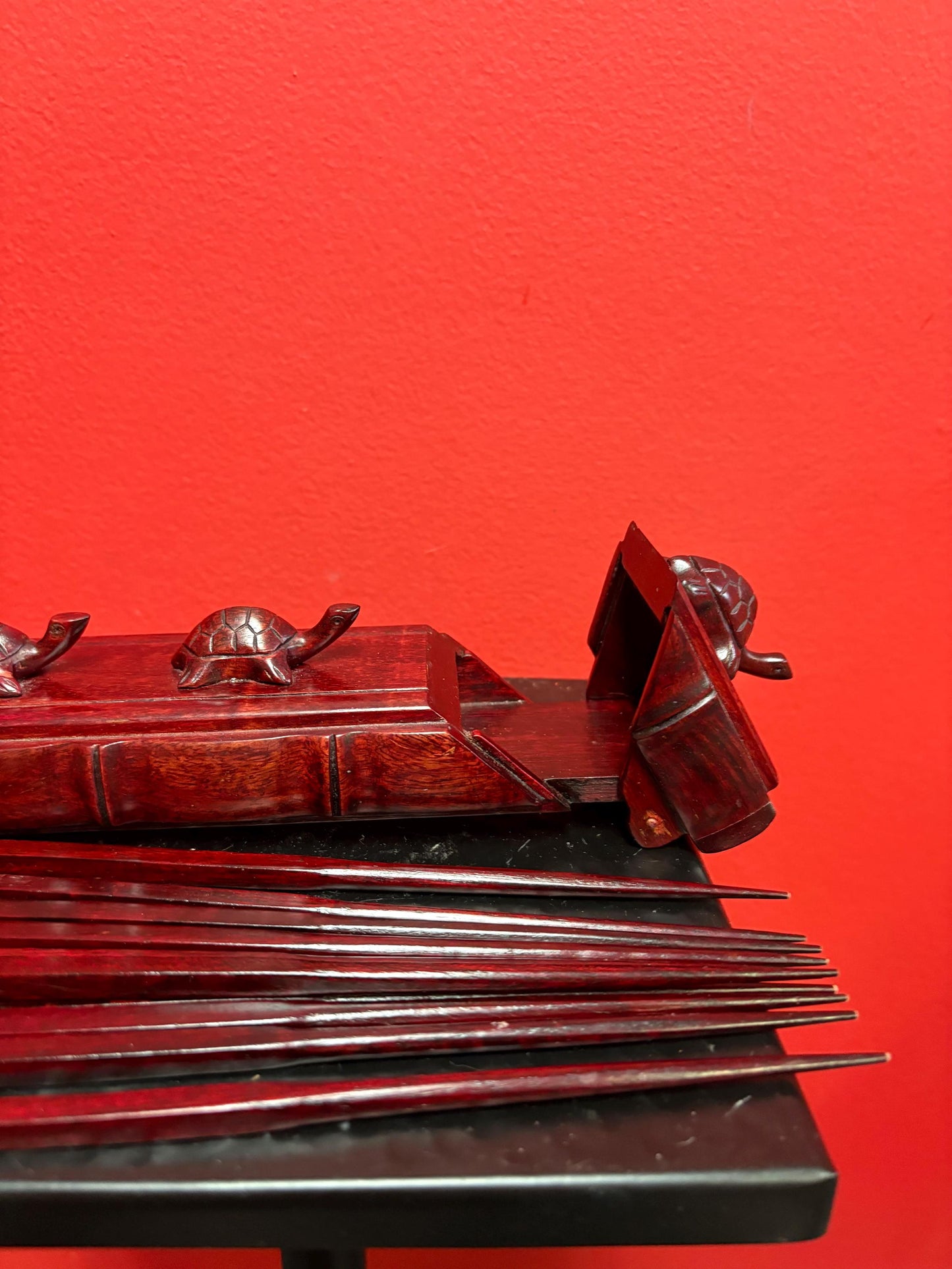 Lovely Asian Rosewood chopstick box with turtles on top  9 inches long  comes with five sets of chopsticks  wonderful gift