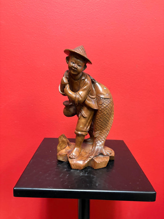 Stunning antique Asian carved wooden 7 1/2 inch tall statue of a fisherman  intense detail and beautiful eyes  wow