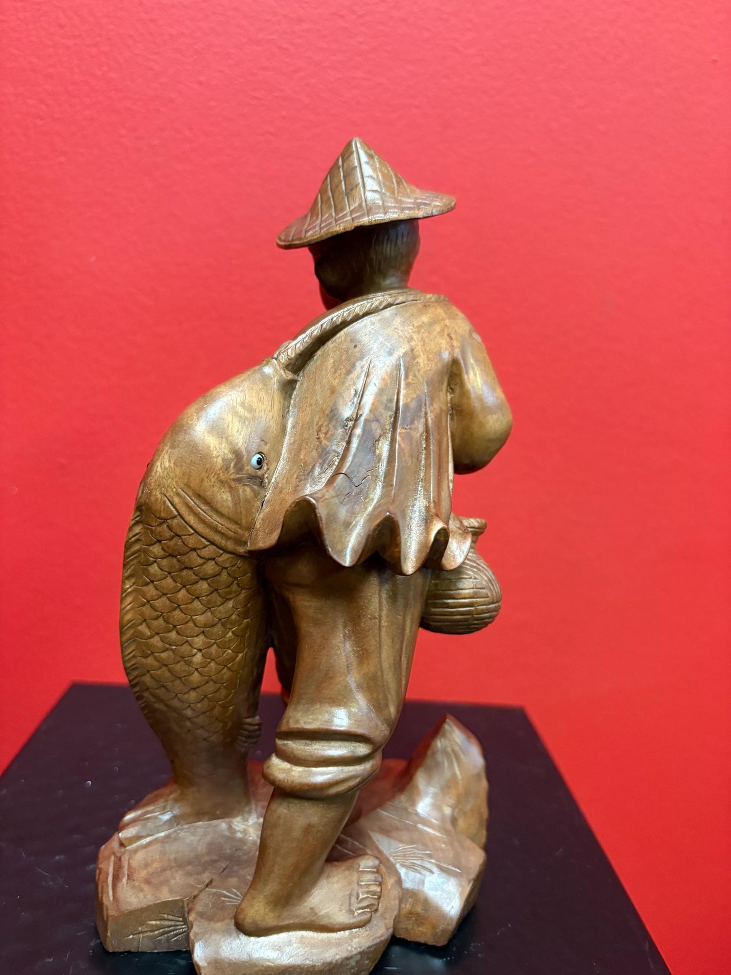Stunning antique Asian carved wooden 7 1/2 inch tall statue of a fisherman  intense detail and beautiful eyes  wow