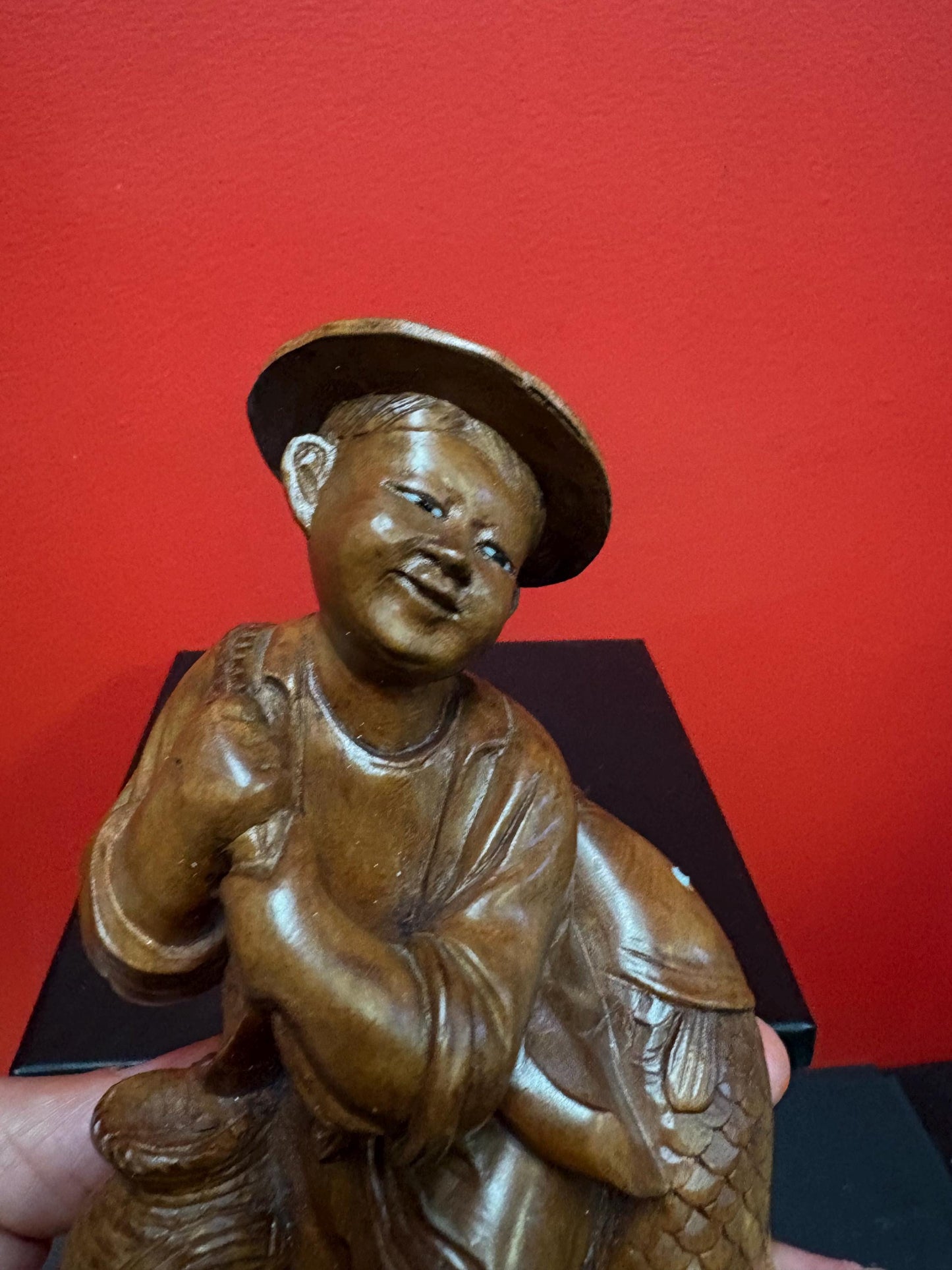 Stunning antique Asian carved wooden 7 1/2 inch tall statue of a fisherman  intense detail and beautiful eyes  wow