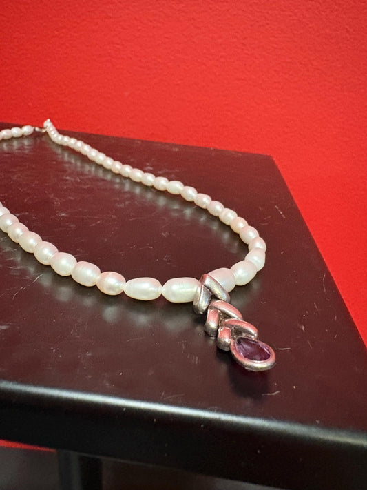Beautiful approximately 15 inch long freshwater pearl necklace - with silver and amethyst charm unusual and wonderful price