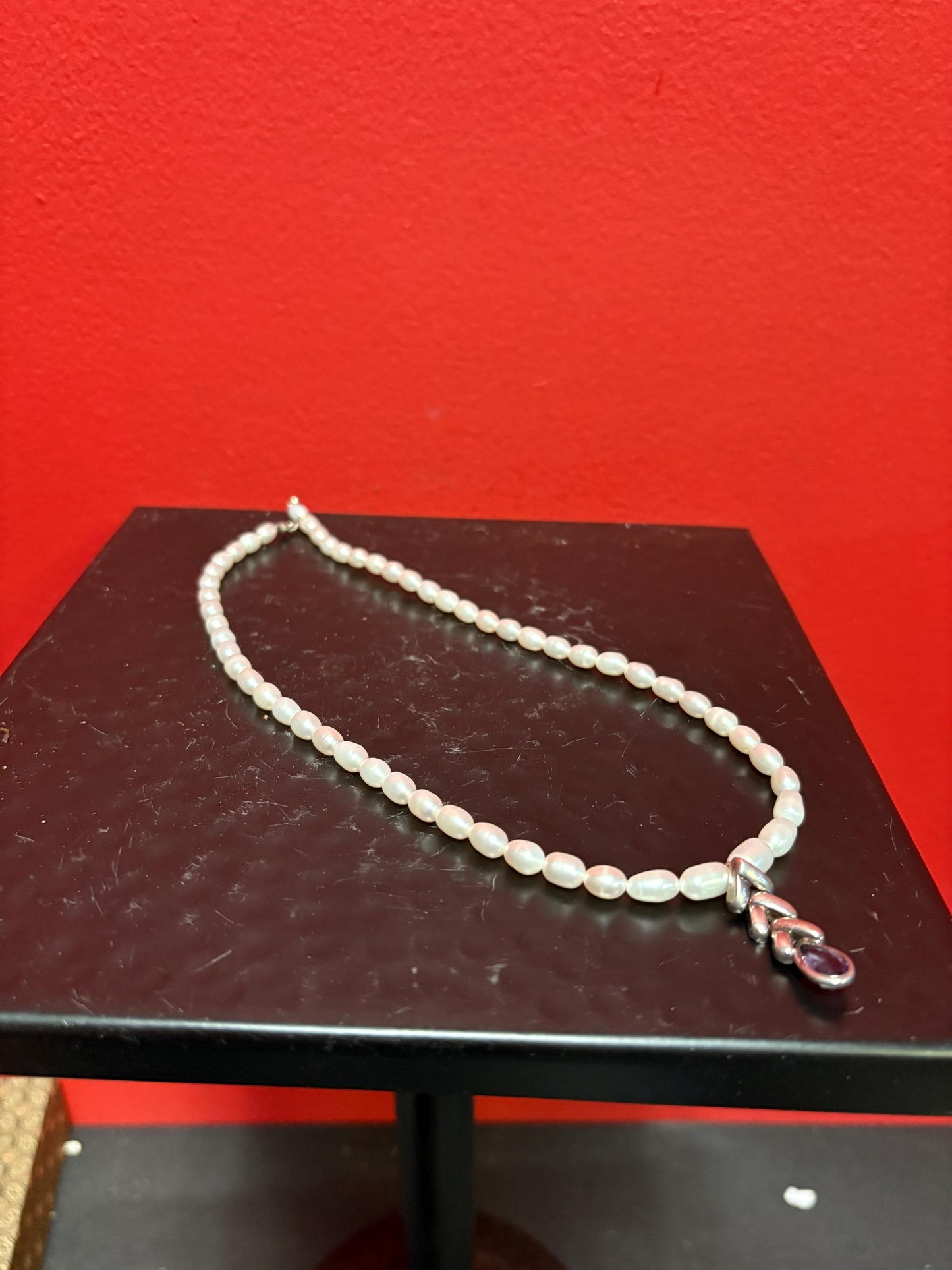 Beautiful approximately 15 inch long freshwater pearl necklace - with silver and amethyst charm unusual and wonderful price