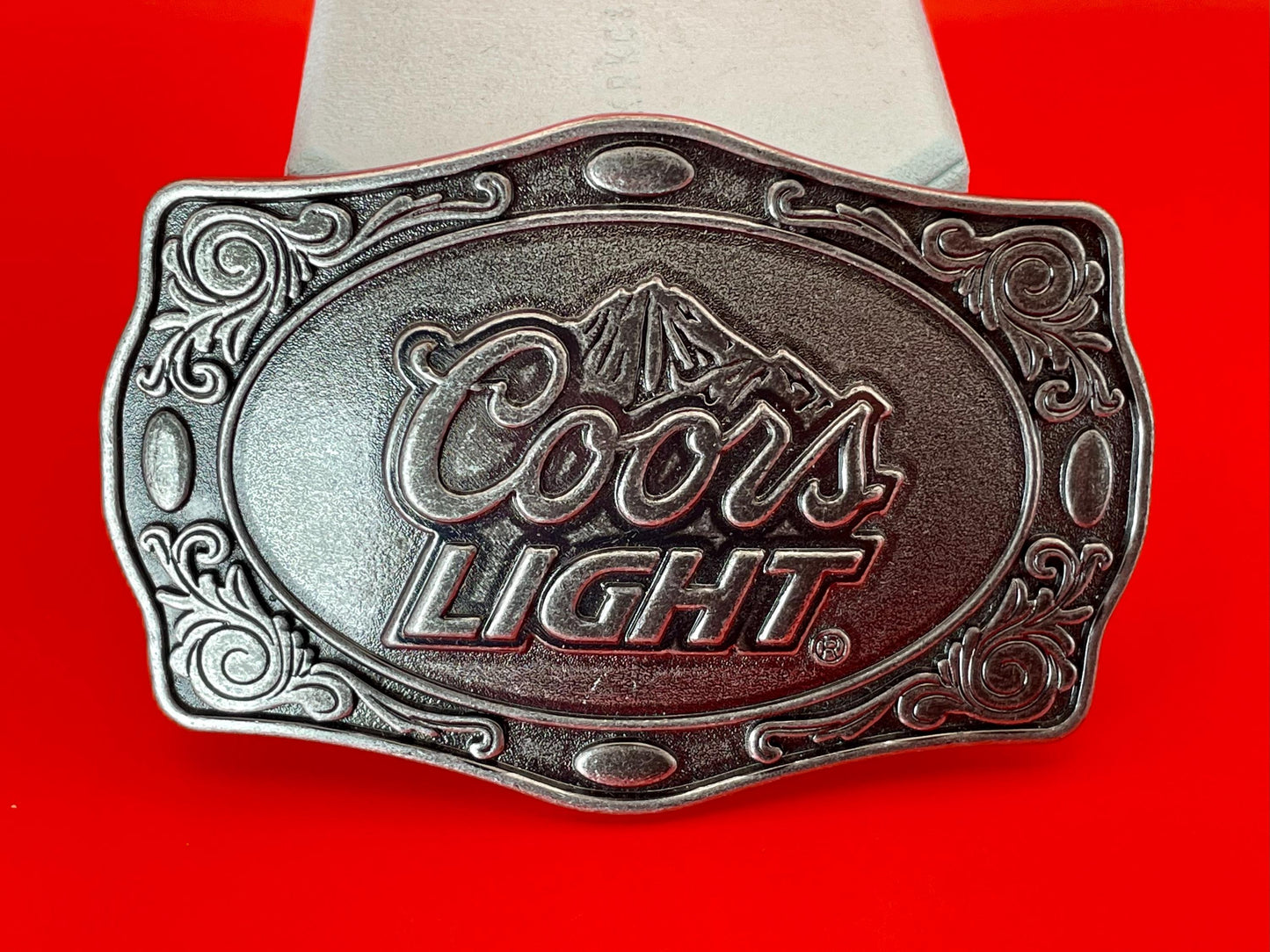 Cool 4 x 2.5 inch belt buckle with Coors Light logo great price and great gift