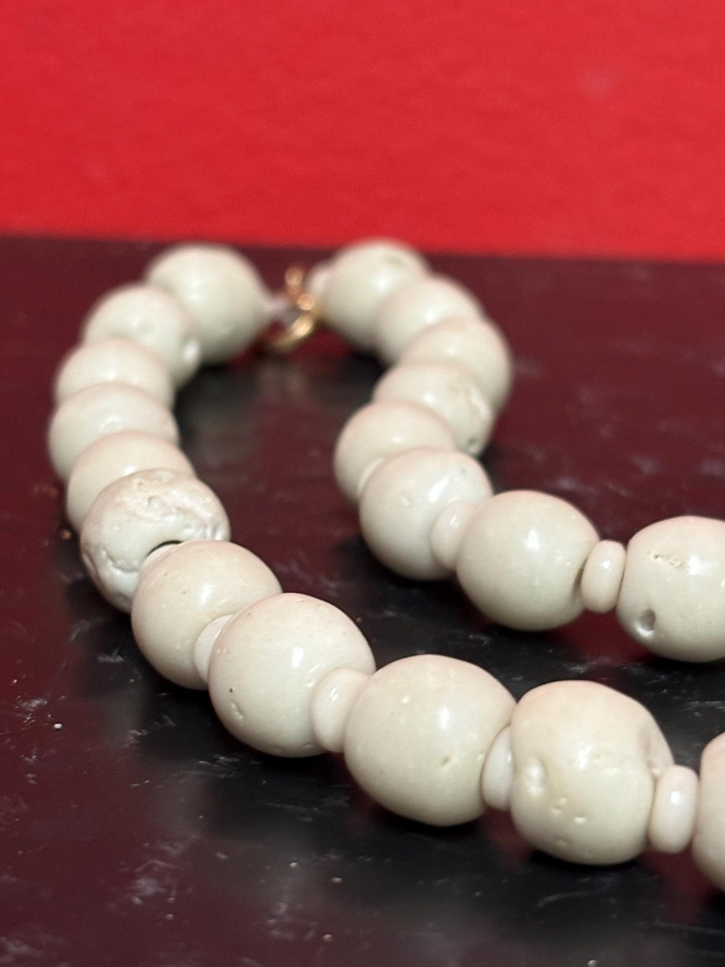 Beautiful early pottery bead necklace  approximately 18 inches long and could be restrung -very unique and cool