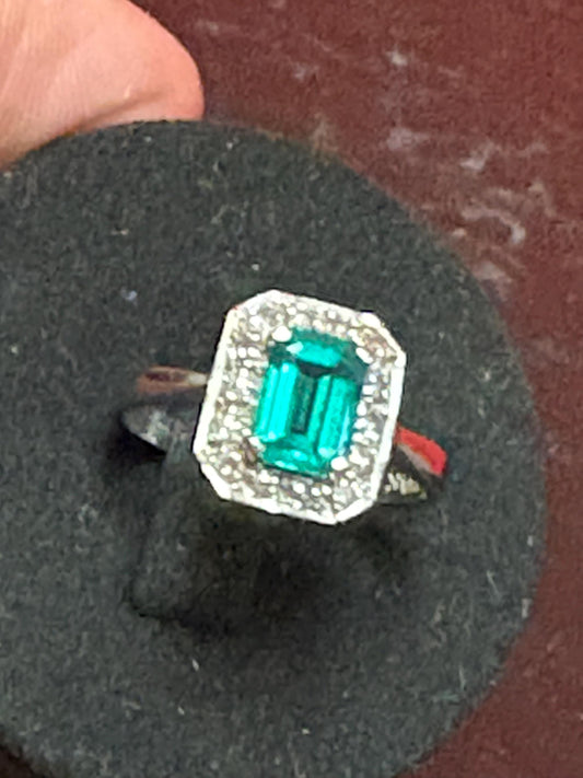 Beautiful 14 karat white gold with emerald and diamonds  size 6  lovely condition - B