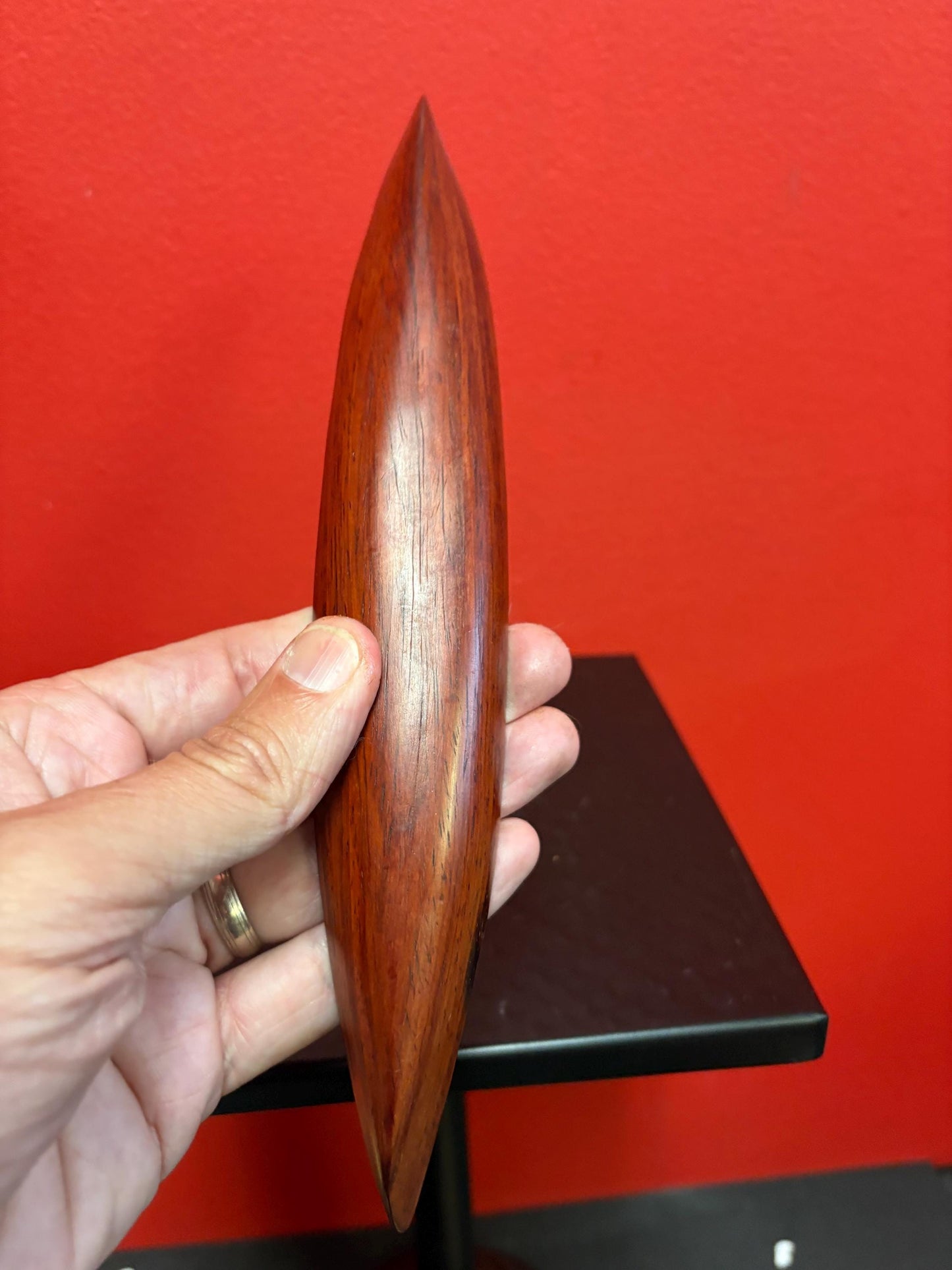 Lovely 10 inch  indigenous wooden model  canoe  simple and elegant with one paddle