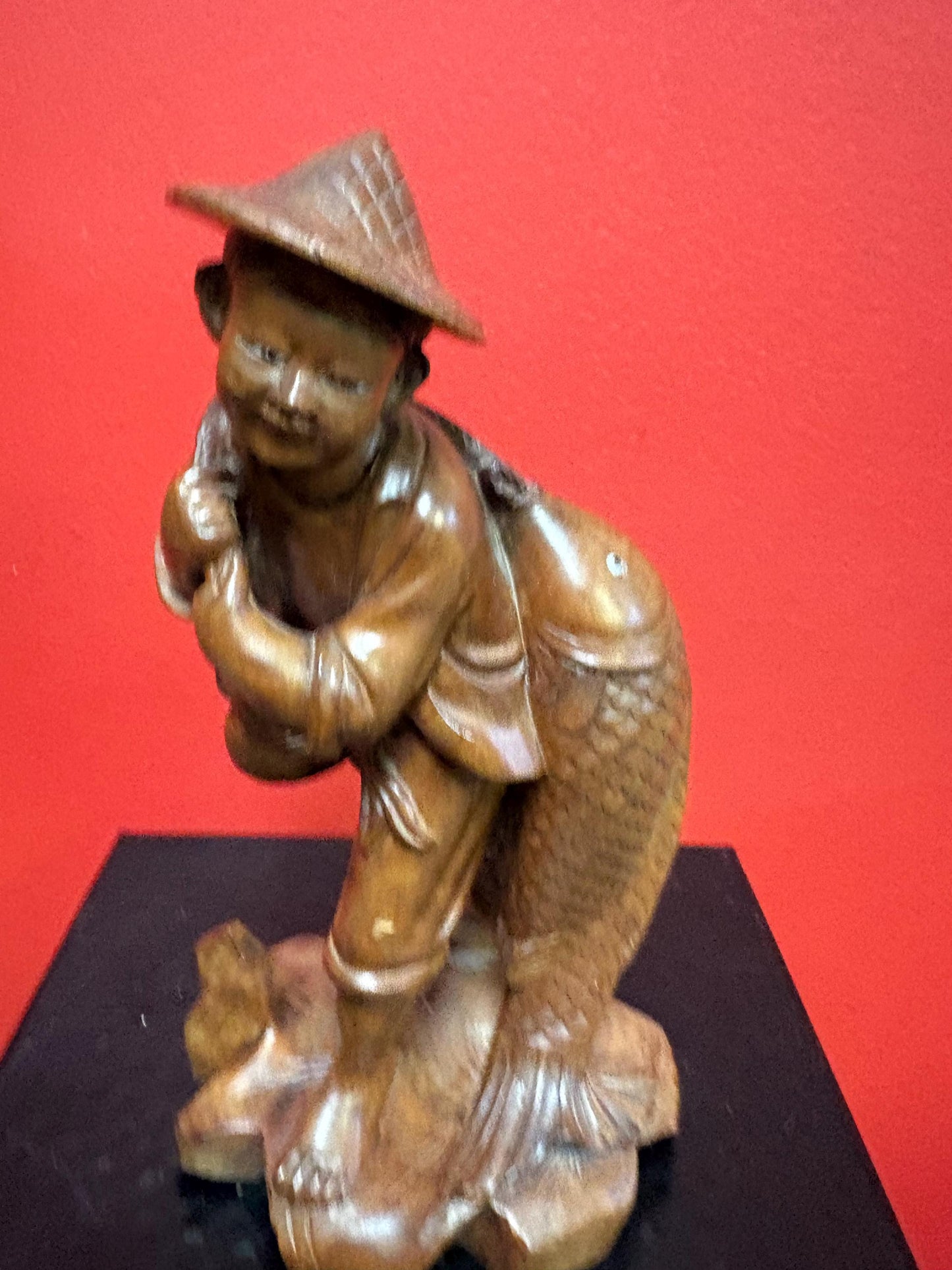 Stunning antique Asian carved wooden 7 1/2 inch tall statue of a fisherman  intense detail and beautiful eyes  wow