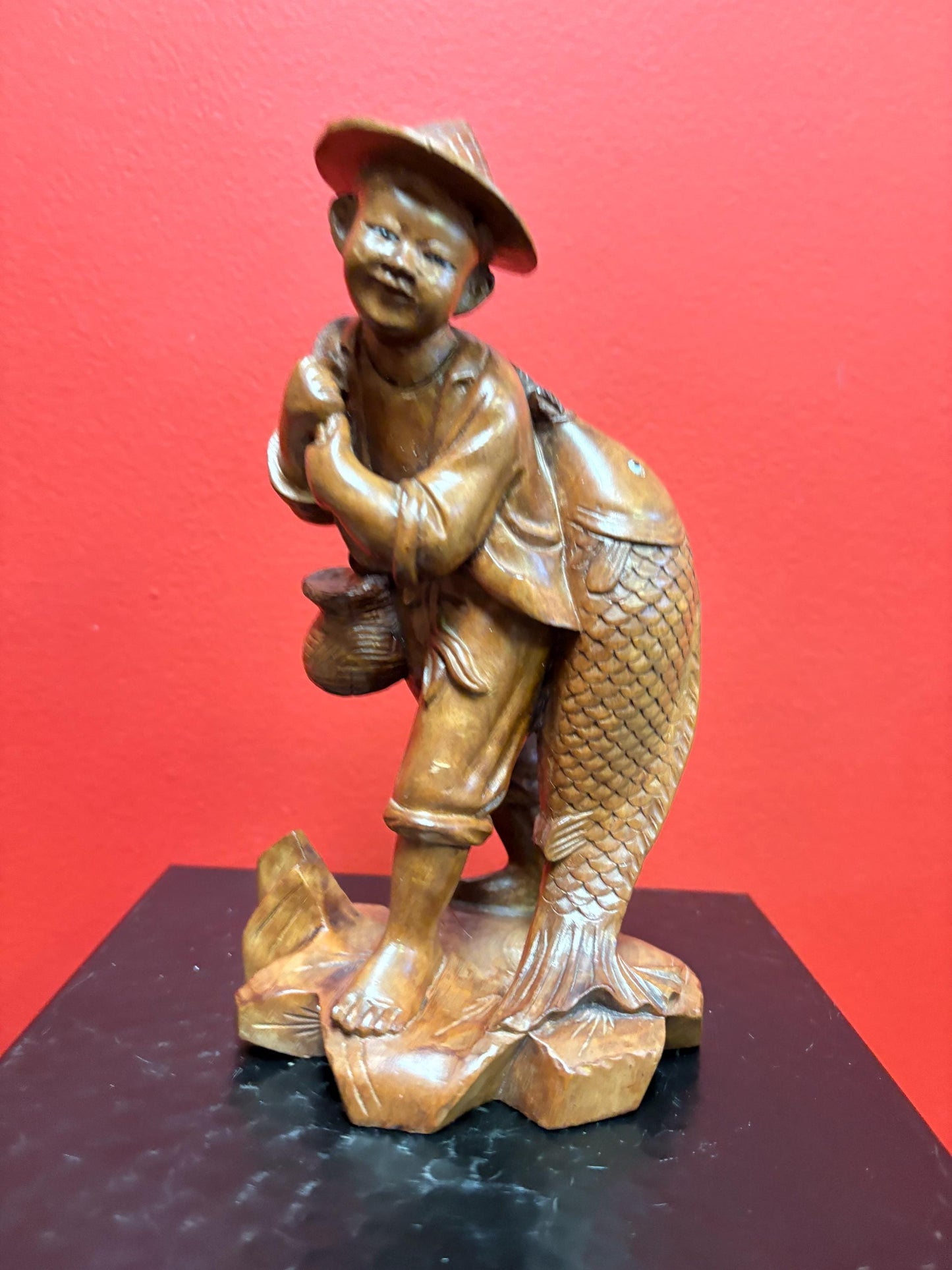 Stunning antique Asian carved wooden 7 1/2 inch tall statue of a fisherman  intense detail and beautiful eyes  wow