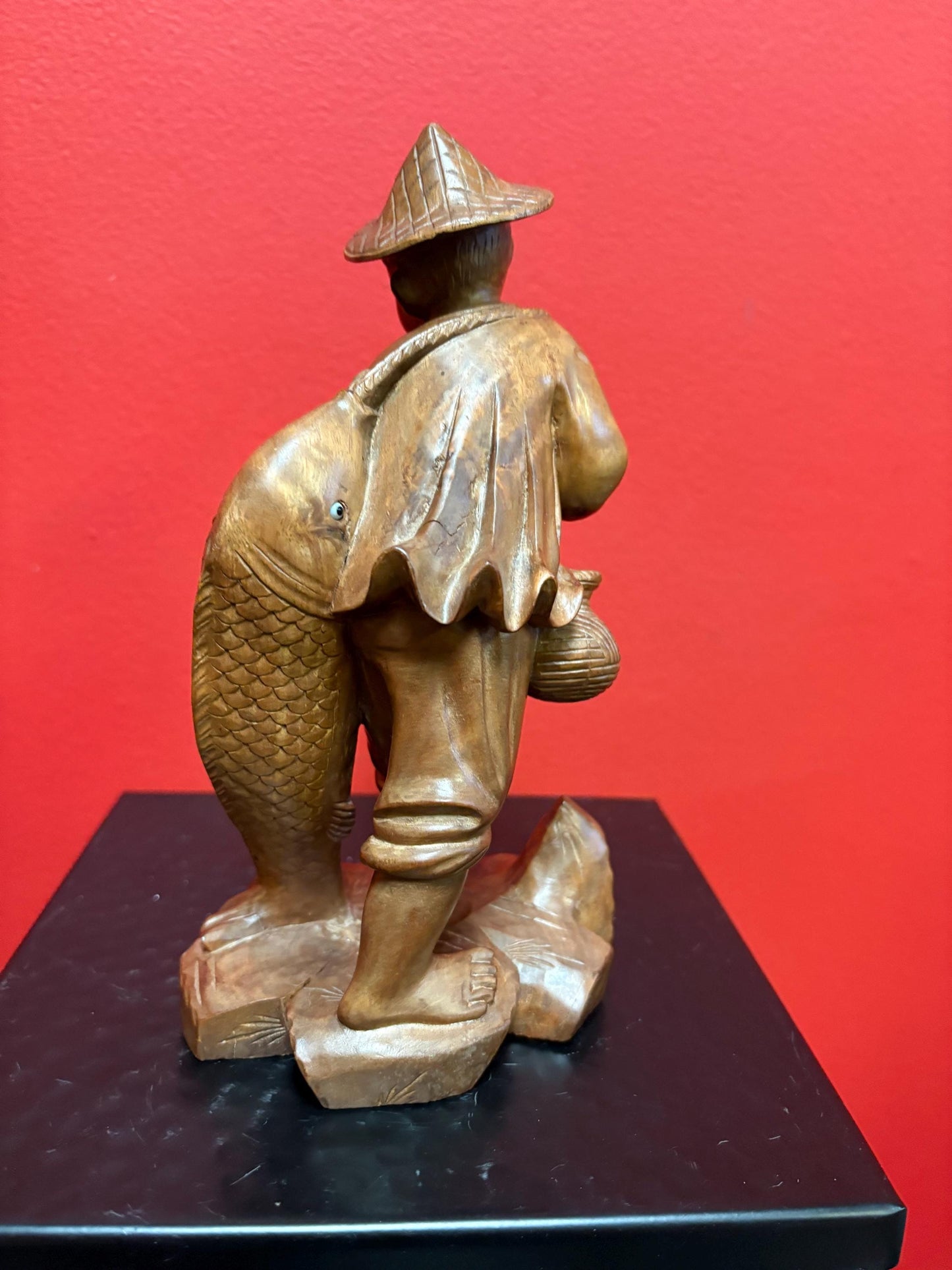 Stunning antique Asian carved wooden 7 1/2 inch tall statue of a fisherman  intense detail and beautiful eyes  wow