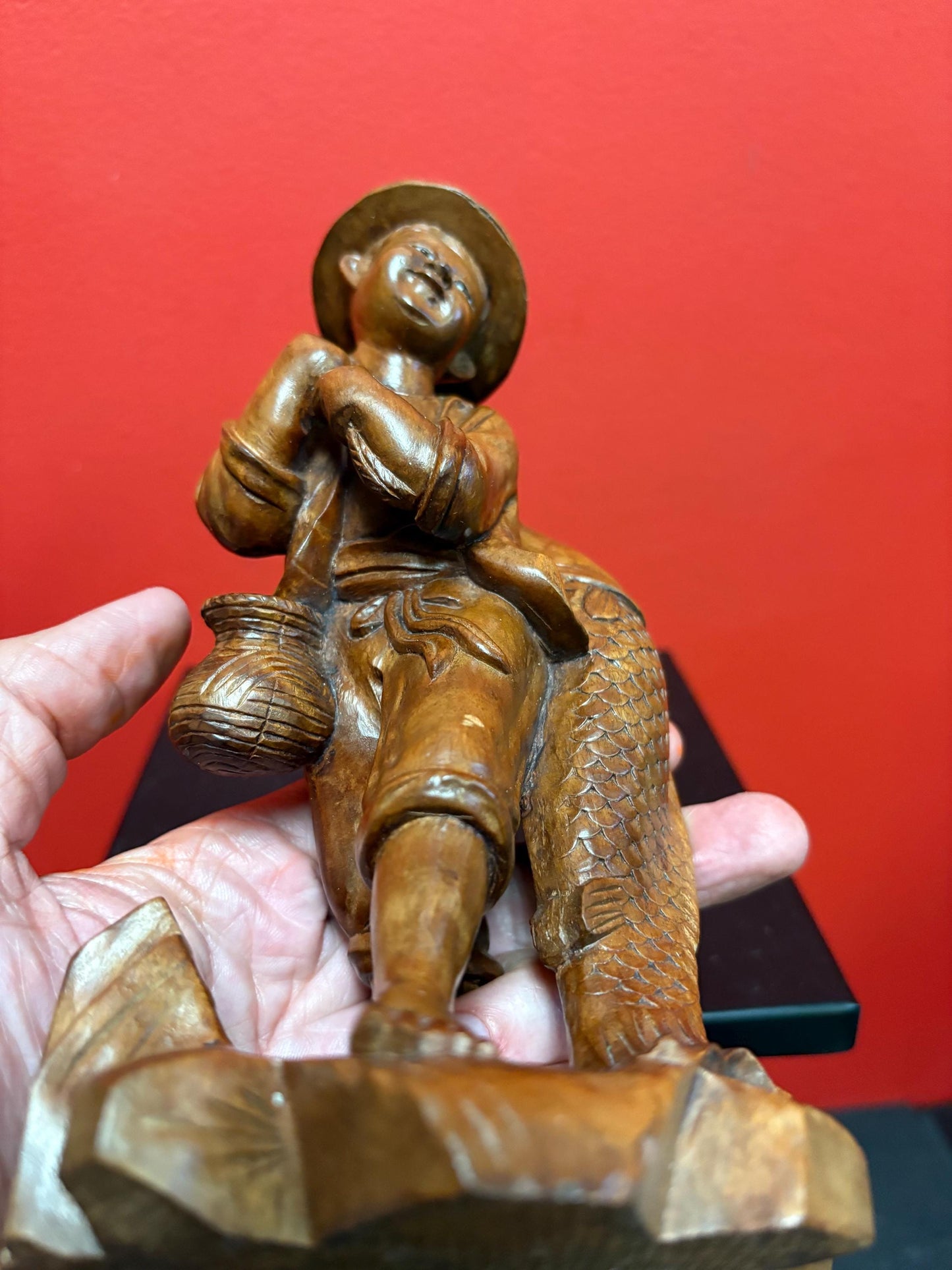 Stunning antique Asian carved wooden 7 1/2 inch tall statue of a fisherman  intense detail and beautiful eyes  wow