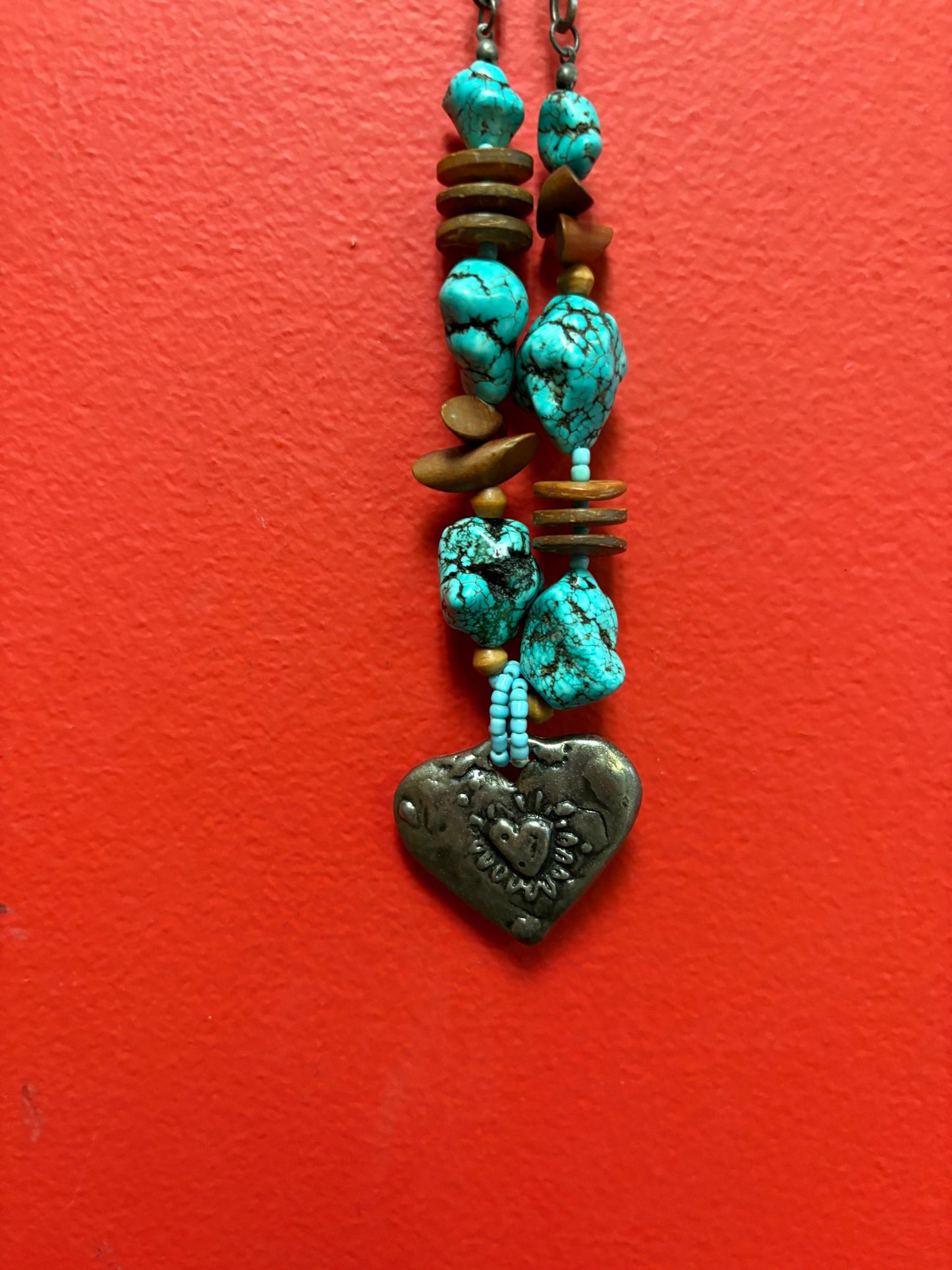 Lovely approximately 20 inch long Navajo style turquoise necklace with silver heart pendant  unique and perfect gift