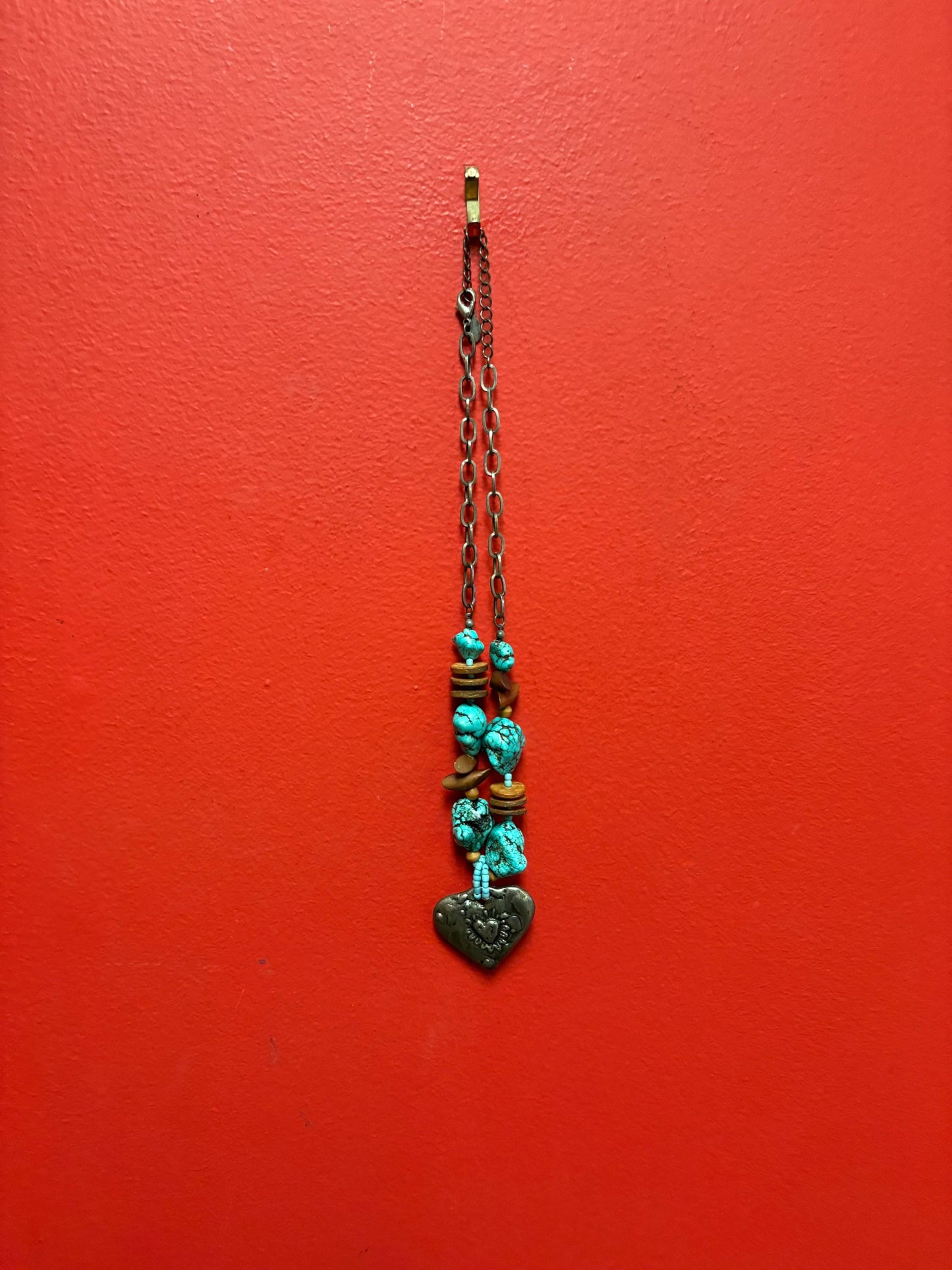 Lovely approximately 20 inch long Navajo style turquoise necklace with silver heart pendant  unique and perfect gift
