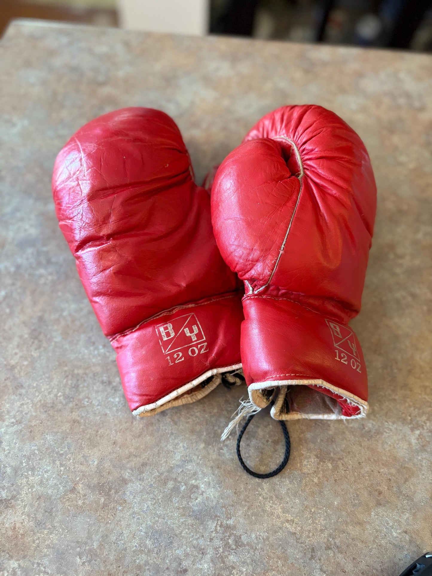 Cool vintage 12 ounce leather boxing gloves   use or display good condition and great gift - 11 inches long
