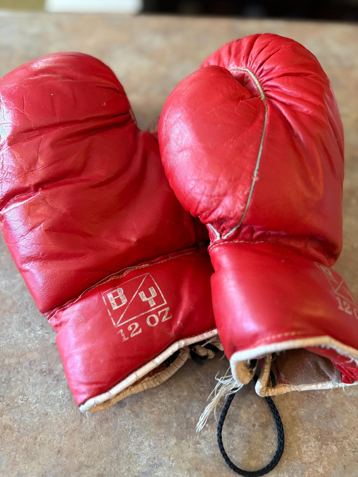 Cool vintage 12 ounce leather boxing gloves   use or display good condition and great gift - 11 inches long