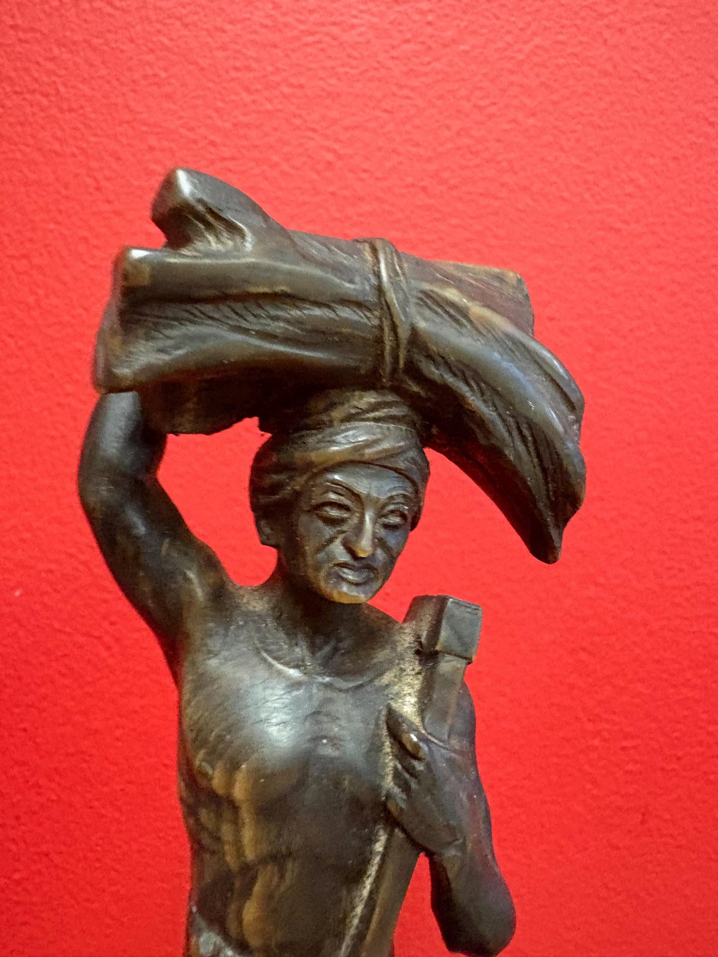 Stunning antique oceanic hand carved horn statue of a warrior on wooden plinth  10 inches high  mint condition