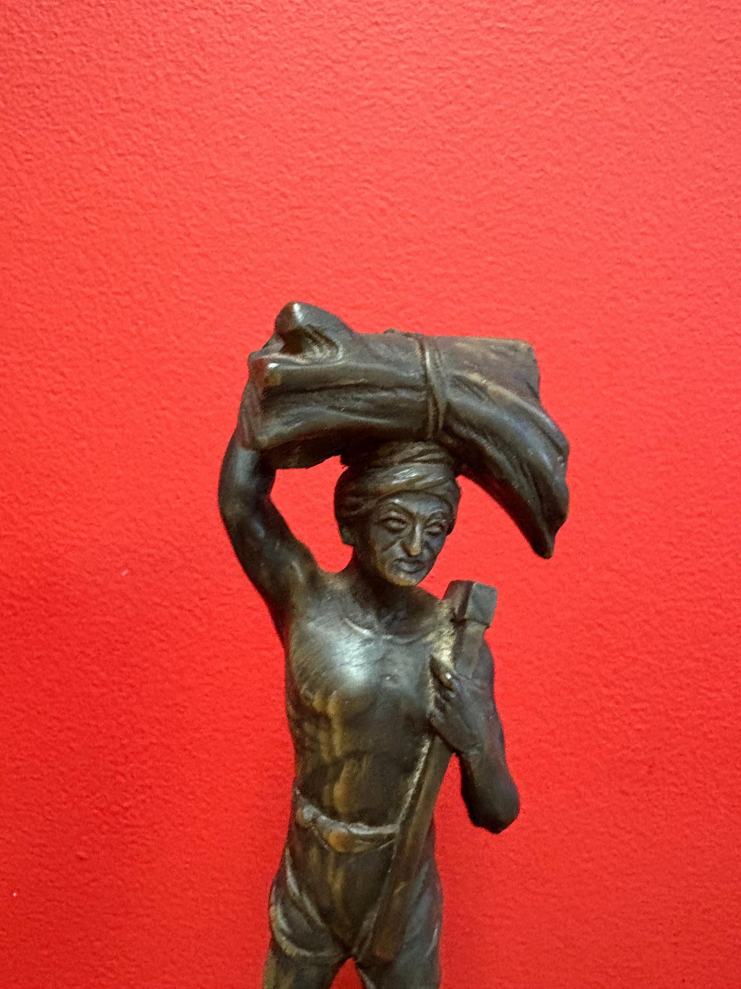 Stunning antique oceanic hand carved horn statue of a warrior on wooden plinth  10 inches high  mint condition