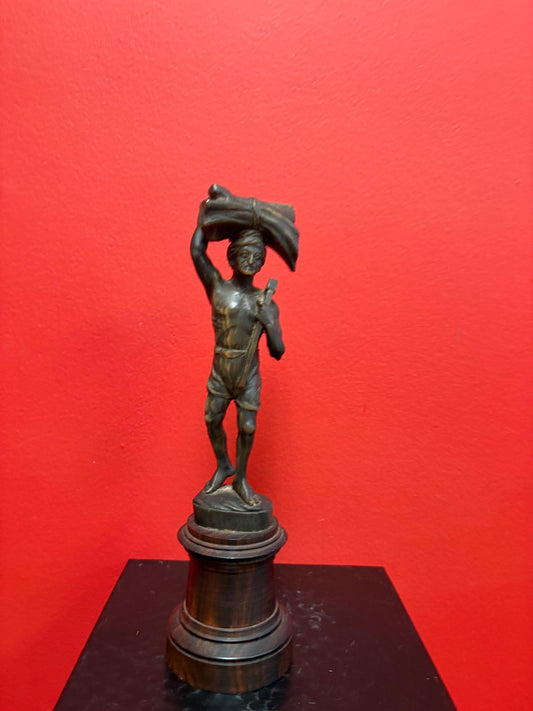 Stunning antique oceanic hand carved horn statue of a warrior on wooden plinth  10 inches high  mint condition