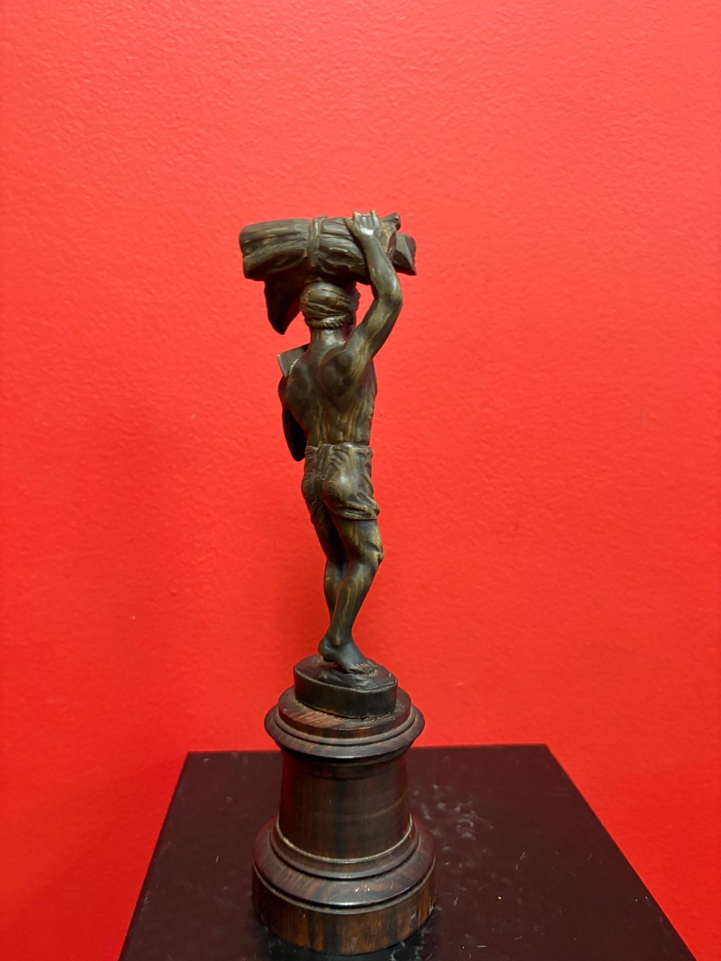 Stunning antique oceanic hand carved horn statue of a warrior on wooden plinth  10 inches high  mint condition