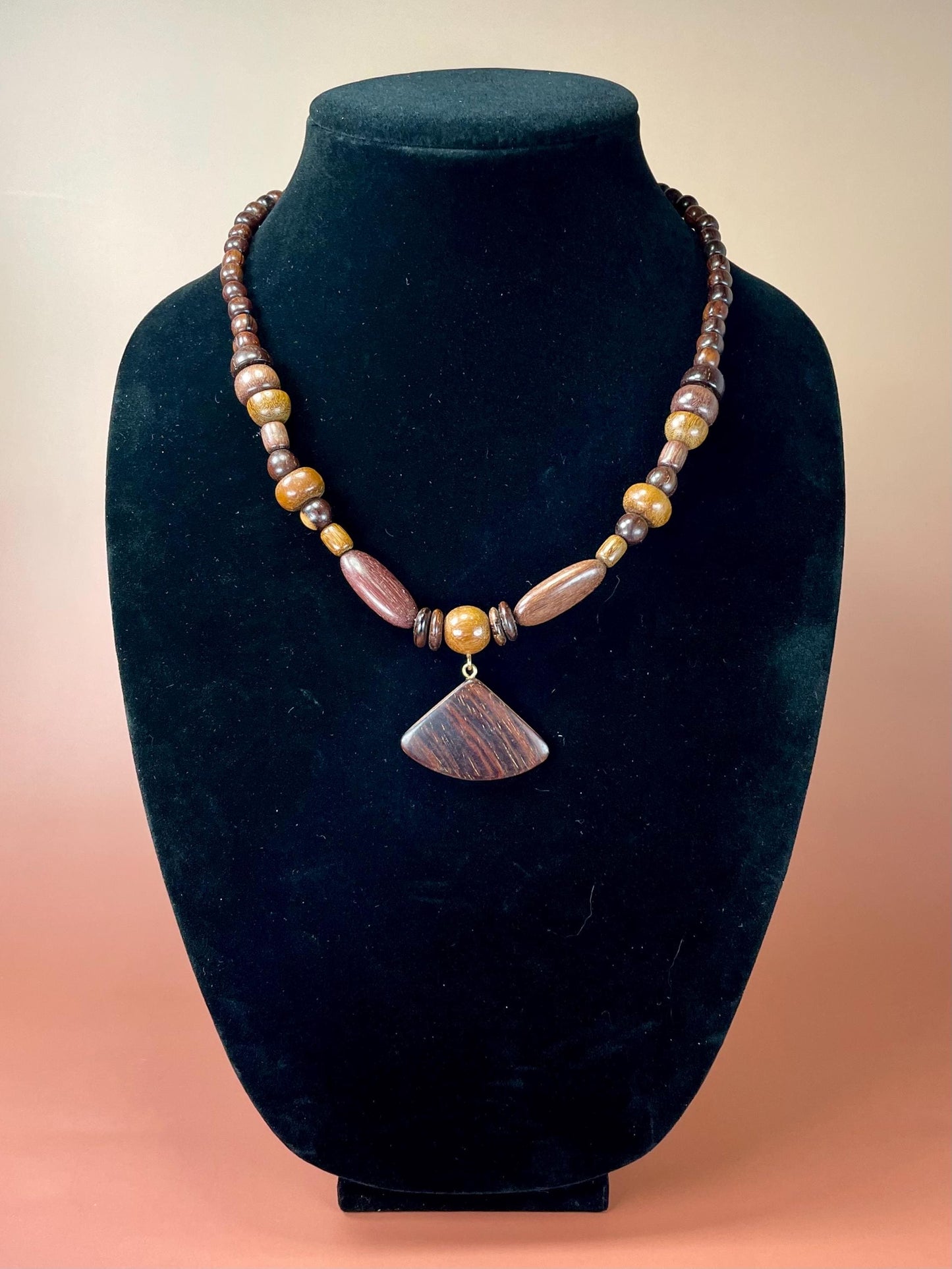 Lovely 20 inch long wood Beaded necklace with 1 inch pendant