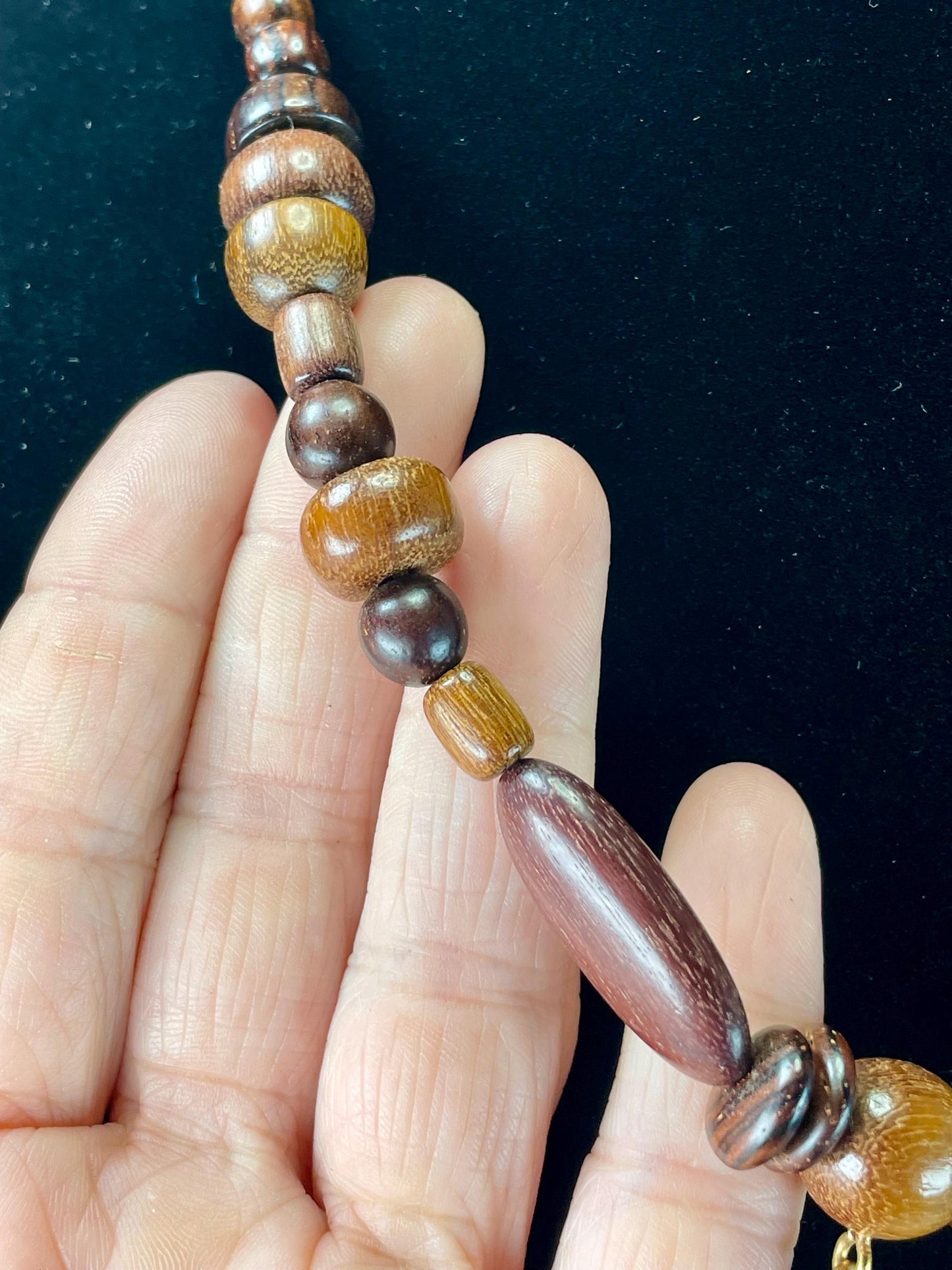 Lovely 20 inch long wood Beaded necklace with 1 inch pendant