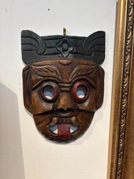 Beautiful older Asian hardwood mask with cheeky tongue ready to hang or gift  10 x 8 inches across  good value