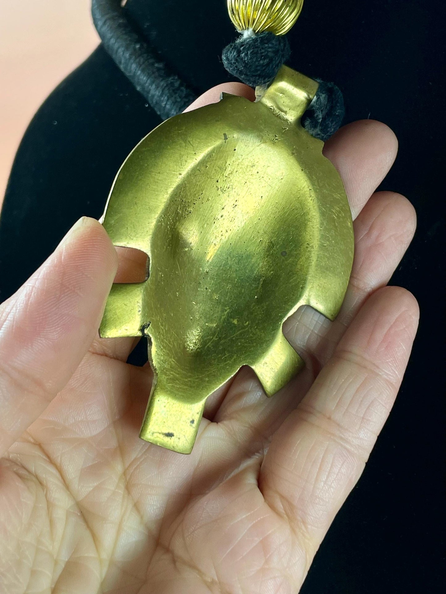 Brass Face Pendant Necklace on Wrapped Cord  16