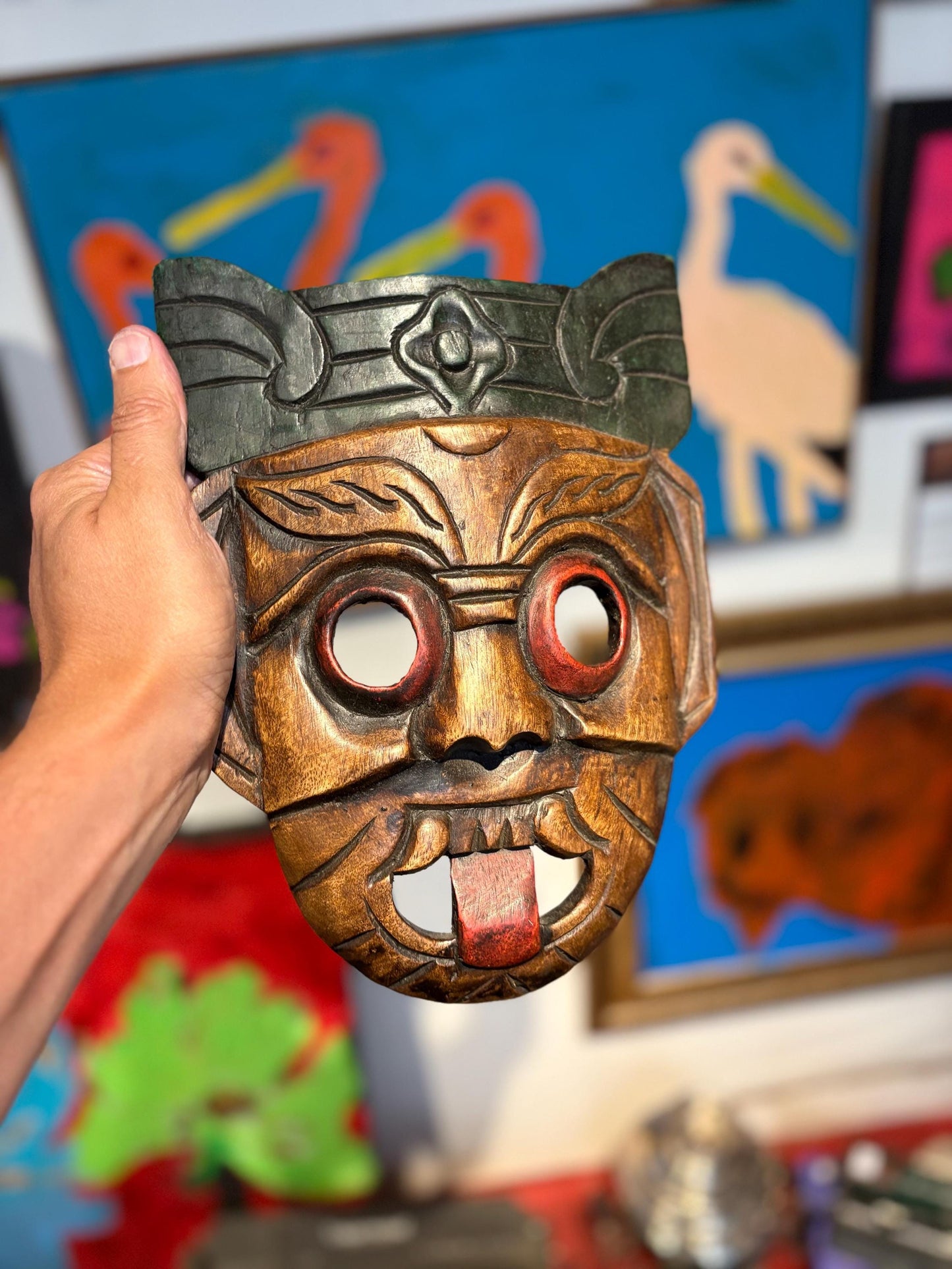 Beautiful older Asian hardwood mask with cheeky tongue ready to hang or gift  10 x 8 inches across  good value