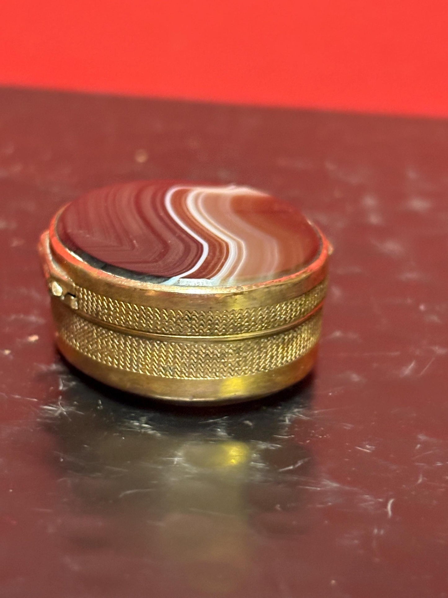 Stunning late 19 century French agate and brass box  1.5 inches across .5 inches high its absolutely beautiful and in perfect condition