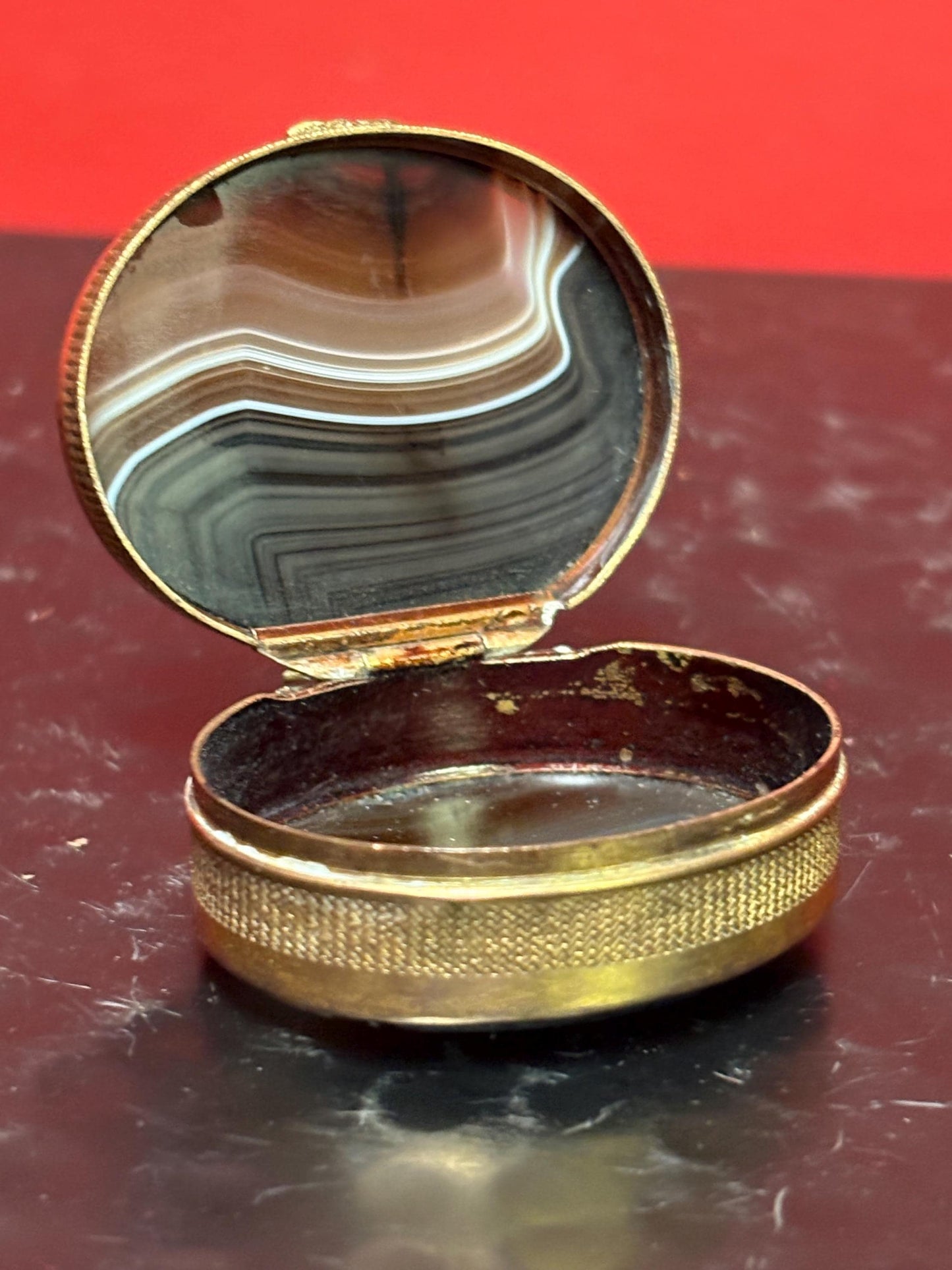 Stunning late 19 century French agate and brass box  1.5 inches across .5 inches high its absolutely beautiful and in perfect condition