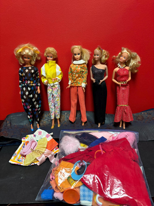 Five vintage Barbie dolls with xtra clothes  great set  great value