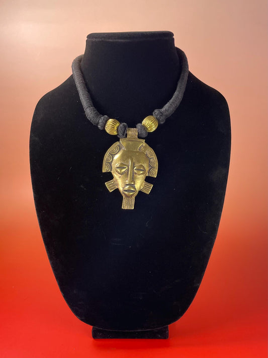 Brass Face Pendant Necklace on Wrapped Cord  16